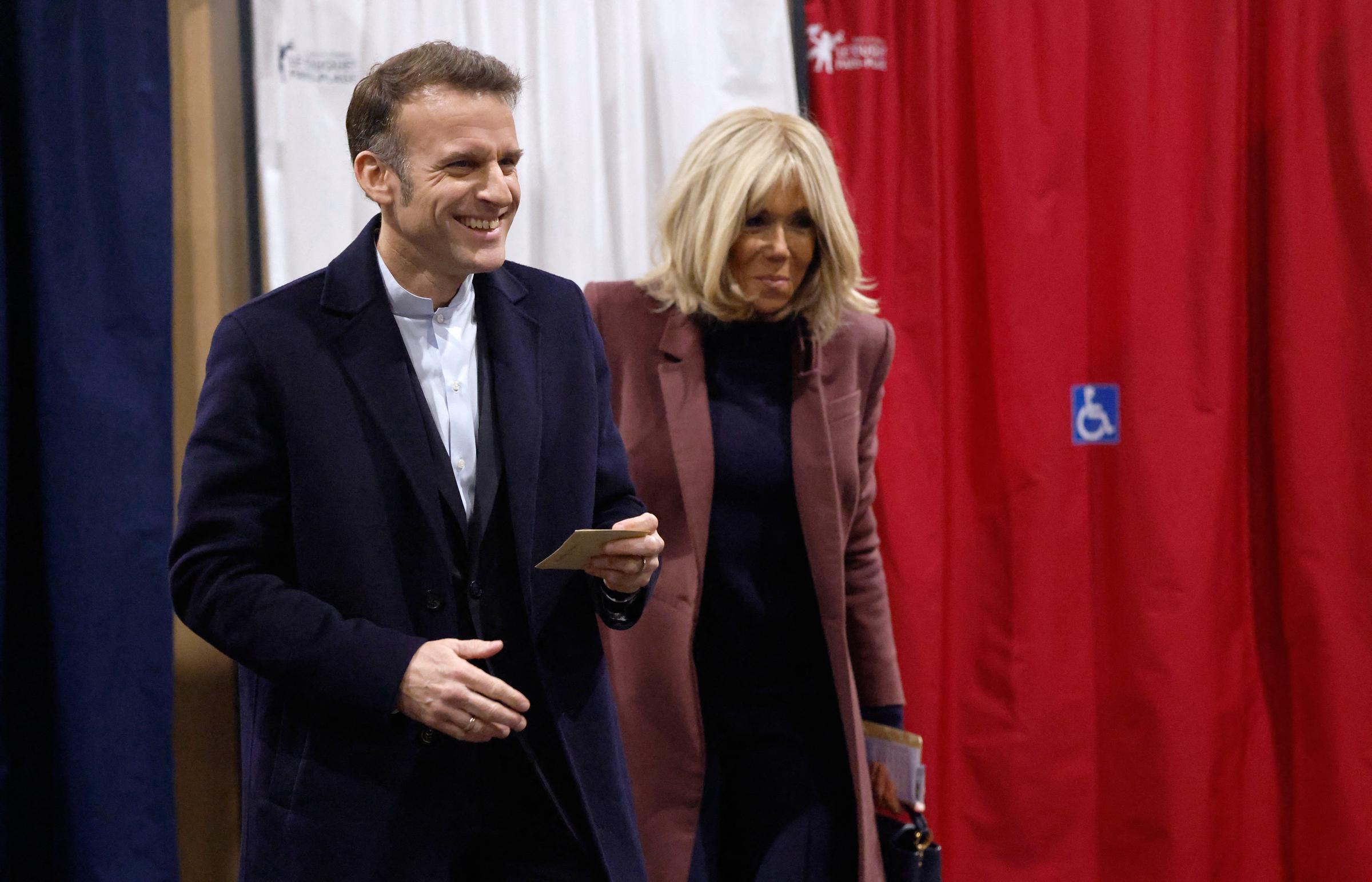 French President Emmanuel and his wife Brigitte Macron leave the polling booth in Le Touquet, northern France, on March 15, 2026 | Source: Getty Images