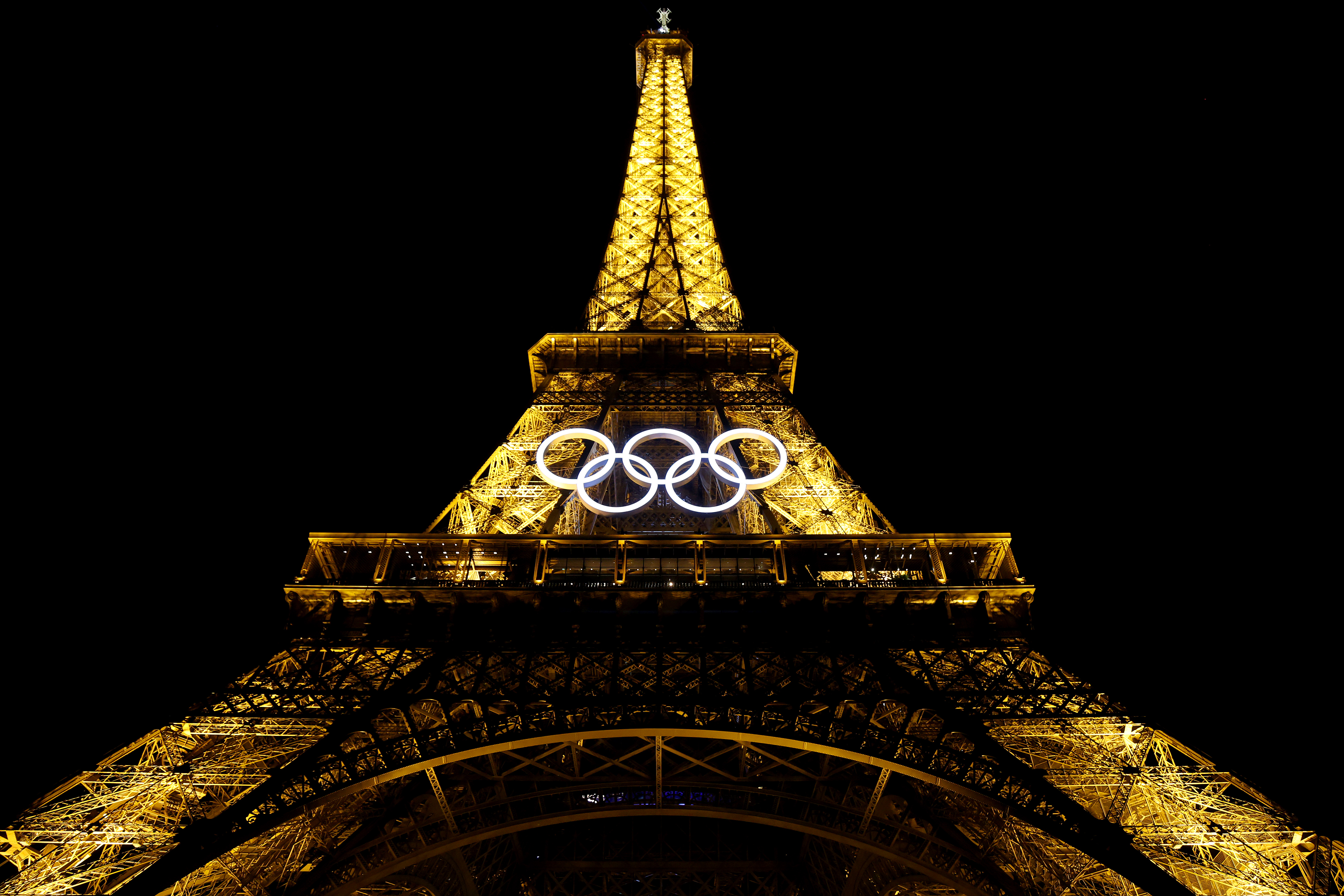 Lights illuminate the Eiffel Tower during the Opening Ceremony of the Olympic Games Paris 2024 at in Paris, France, on July 26, 2024. | Source: Getty Images