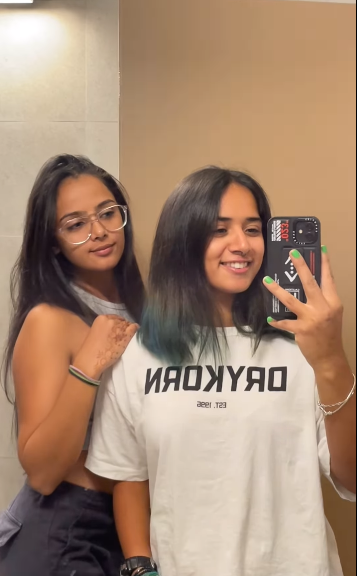 Radhika Yadav and her best friend taking selfies and recording videos in front of a mirror, from a clip posted by her best friend, Himaanshika Singh Rajput, on July 12, 2025 | Source: Instagram/himaanshika