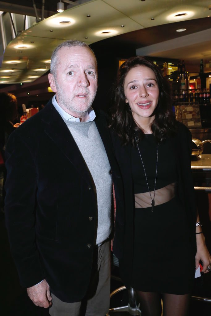 Le réalisateur Fabio Conversi et Balandine, sa fille et celle de Fanny Ardant le 7 janvier 2014 à Paris, France.  | Photo : Getty Images.