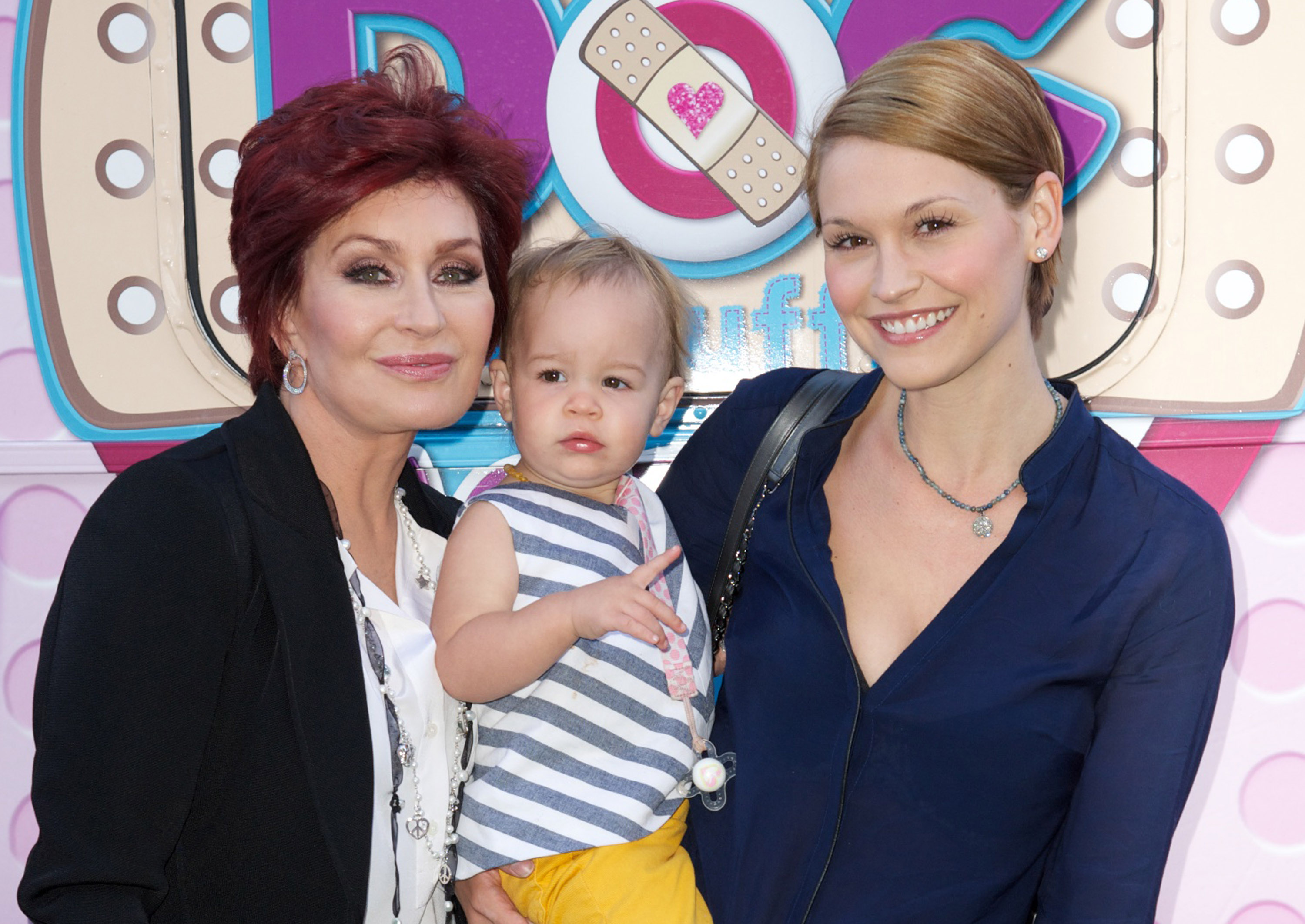 Sharon Osbourne, Pearl, and Lisa Stelly during the Disneys Juniour's "Doc McStuffins Doc Mobile" at the Grove on September 26, 2013, in Los Angeles, California. | Source: Getty Images