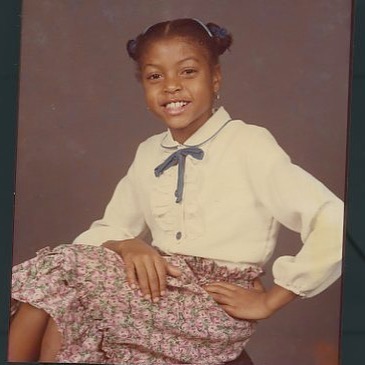 The actress as a little girl posing for a photo, posted on May 15, 2020. | Source: Facebook/Taraji P. Henson