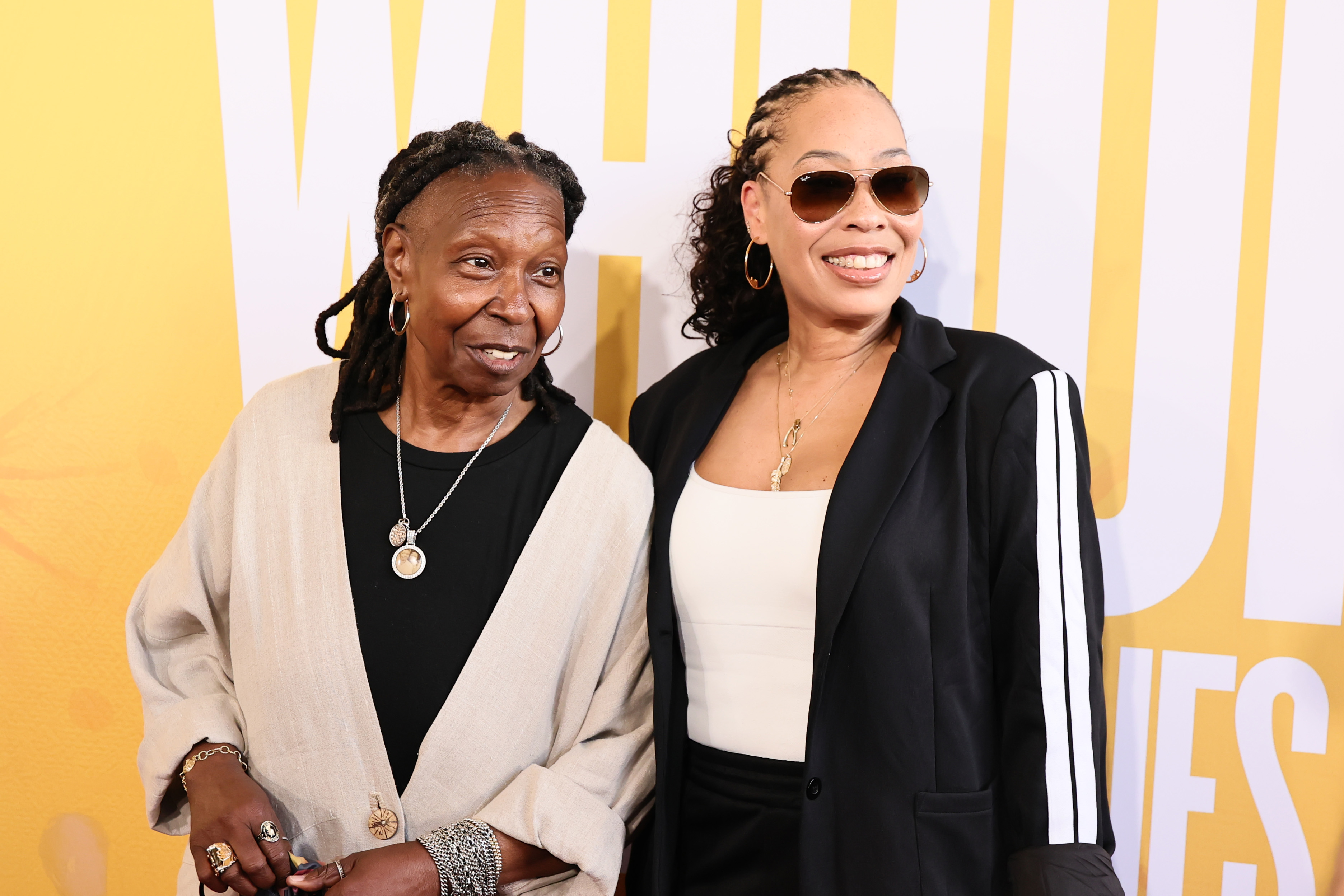 Whoopi Goldberg and Alexandrea Martin Dean smile together on the red carpet at the opening night of "The Whoopi Monologues" in New York City. | Source: Getty Images