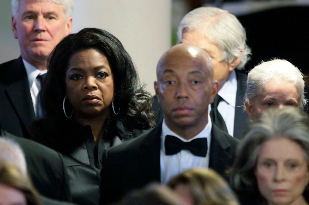 Oprah Winfrey and Russell Simmons attend the funeral of Eunice Kennedy Shriver , August 2009 | Source: Getty Images