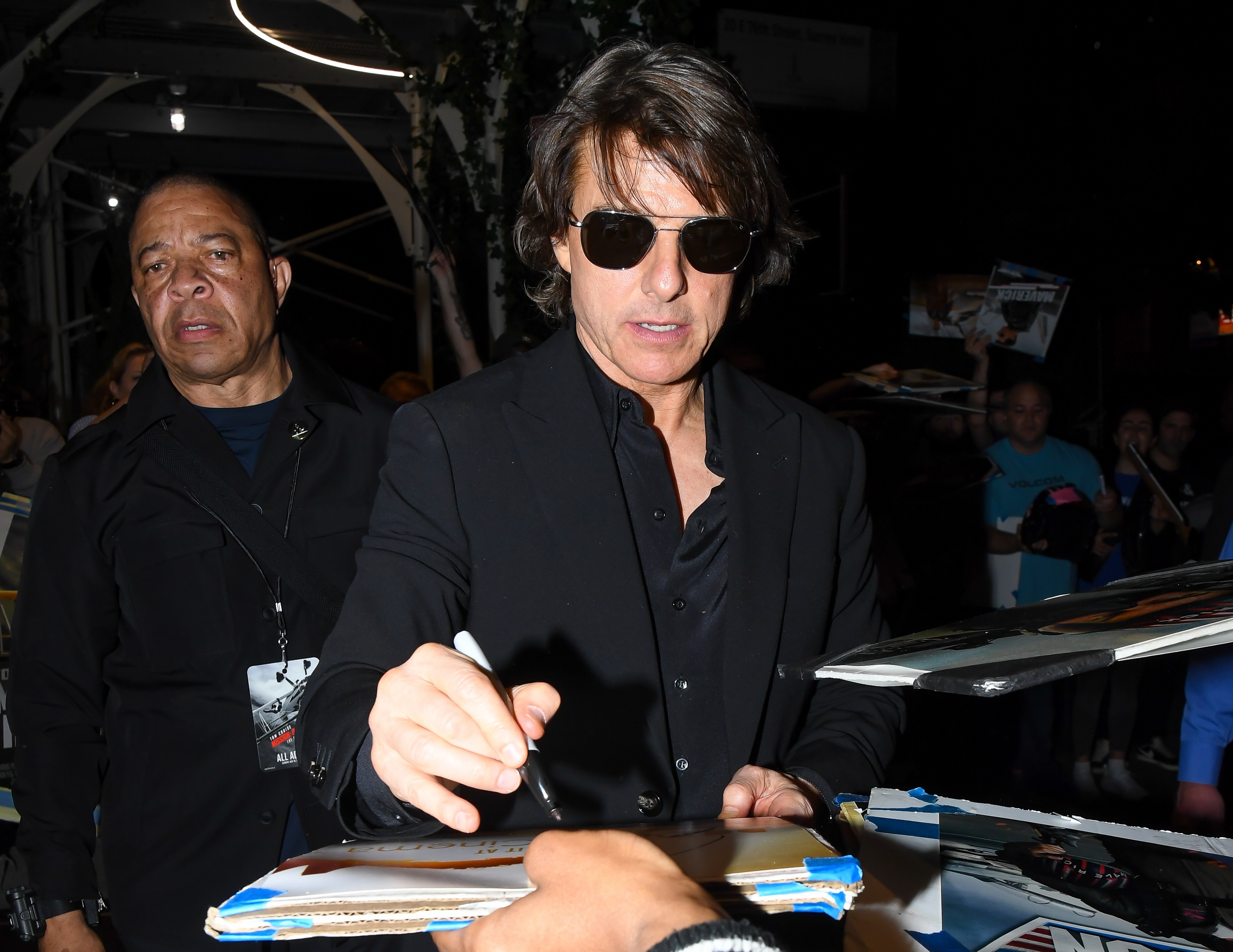 Tom Cruise signing autographs after the "Mission: Impossible - The Final Reckoning" premiere on May 18, 2025, in New York, United States. | Source: Getty Images