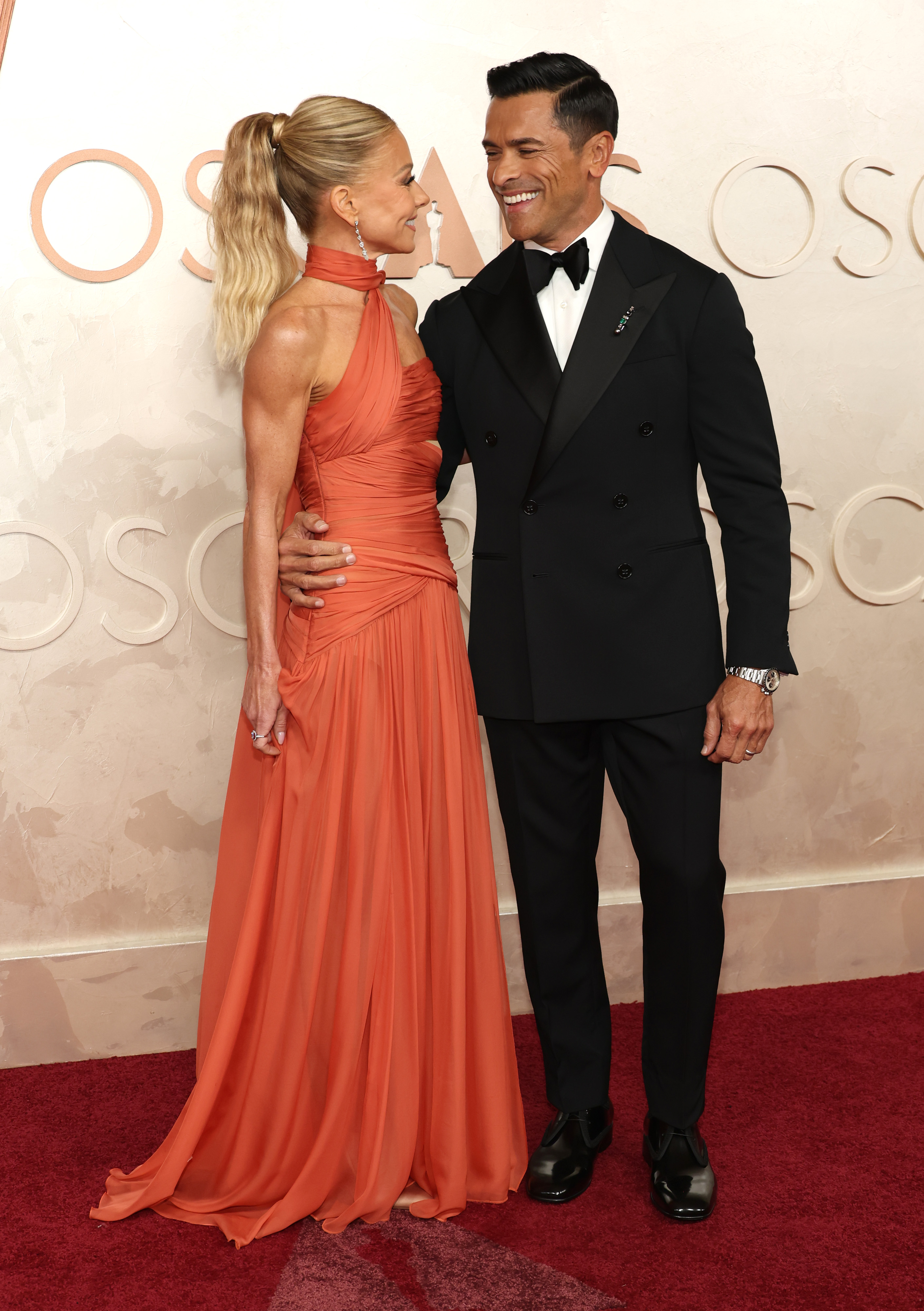 Kelly Ripa and Mark Consuelos are seen at the 97th Annual Oscars at Dolby Theatre on March 2, 2025, in Hollywood, California | Source: Getty Images