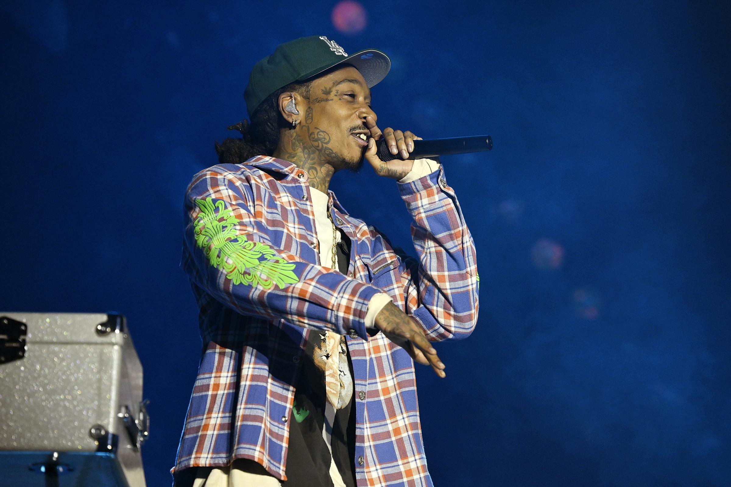 Wiz Khalifa onstage during "Charlie Puth: Whatever's Clever! World Tour" at the Kia Forum on April 29, 2026, in Inglewood, California. | Source: Getty Images