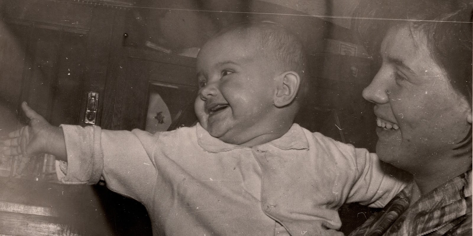 An old photo of a mother and her baby | Source: Shutterstock