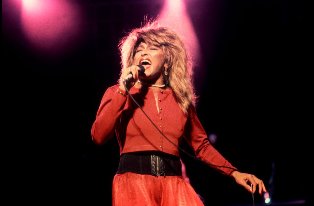 Tina Turner performing at the Poplar Creek Music Theater, Hoffman Estates in Illinois on September 12, 1987. | Source: Getty Images