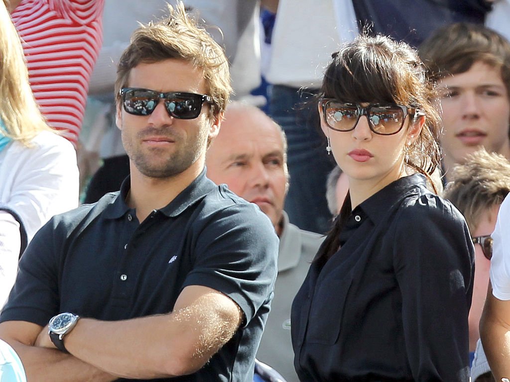French tennis player Arnaud Clement and French singer Nolwen Leroy attended the Davis Cup quarter-final tennis match between France and the United States on April 7, 2012 in Monaco.  |  Photo: Getty Images