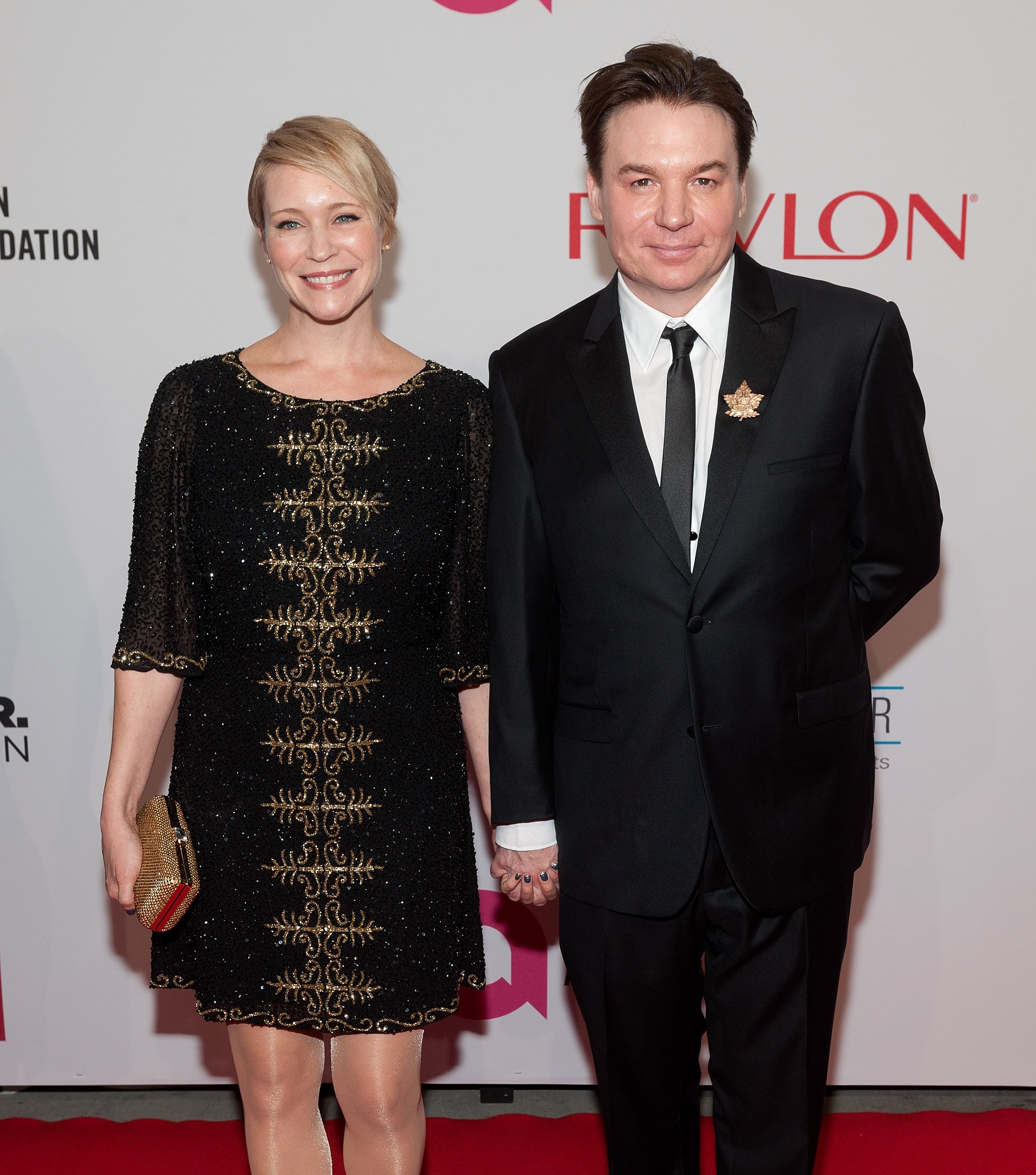 Kelly Tisdale and Mike Myers at the Elton John AIDS Foundation's 13th Annual An Enduring Vision Benefit on October 28, 2014, in New York | Source: Getty Images