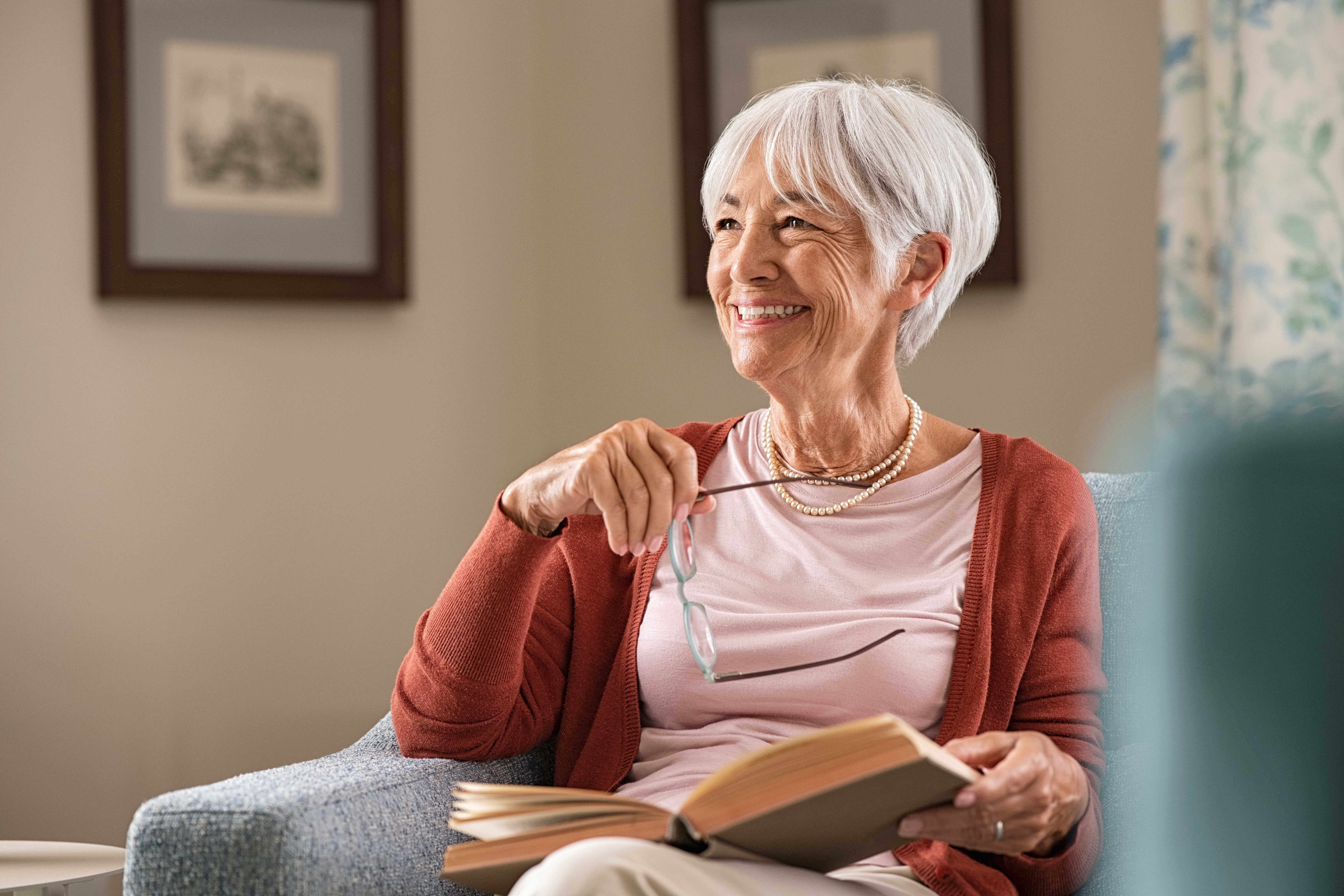 Happy senior woman smiling at home | Source: Getty Images