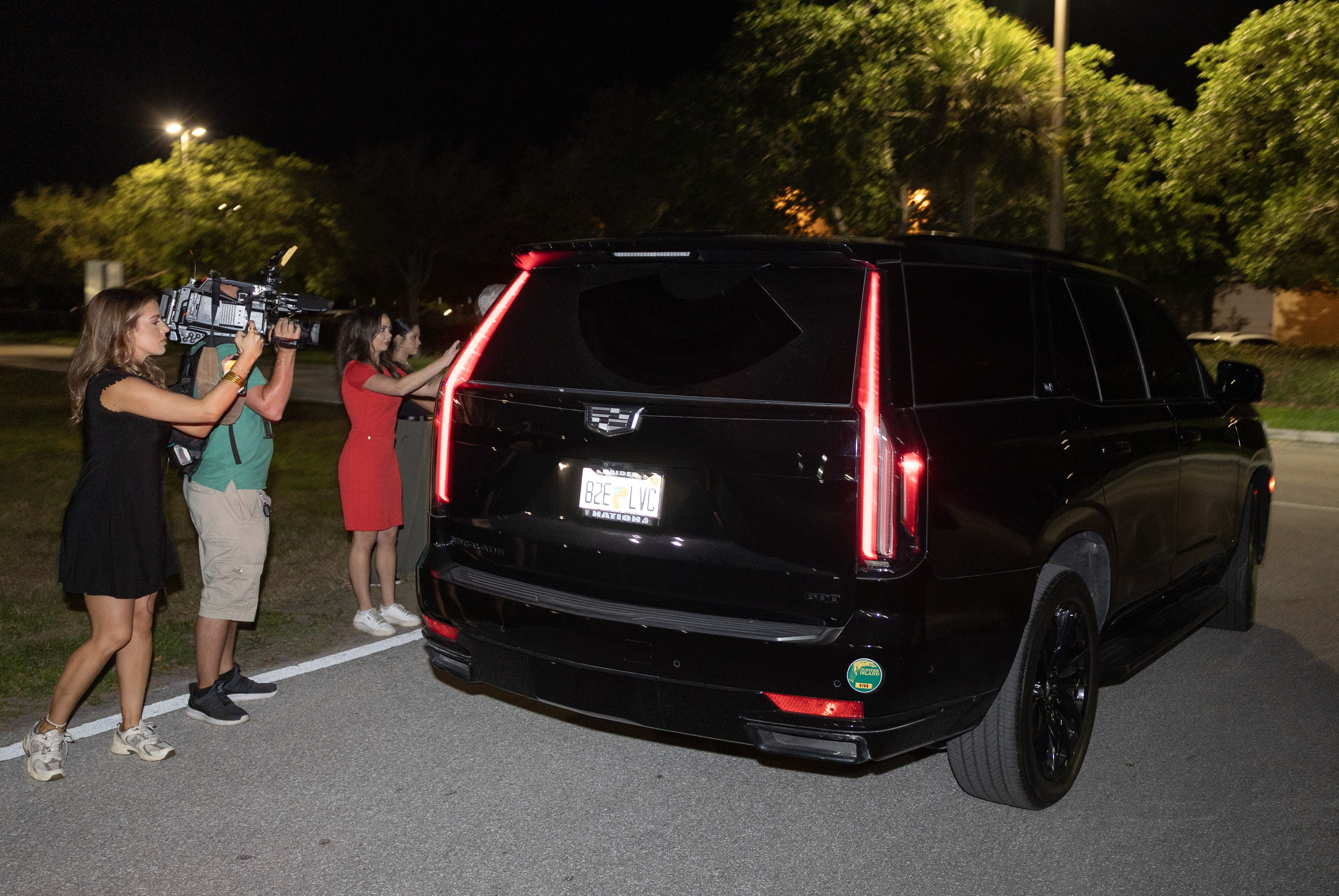 A vehicle carrying Tiger Woods leaves the Martin County Jail after his arrest for driving under the influence following a car crash on March 27, 2026, in Stuart, Florida | Source: Getty Images