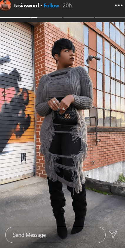 Singer Fantasia Barrino flaunts her curves in a chic long ripped sweater and thigh-high boots. | Photo: instagram.com/tasiasword