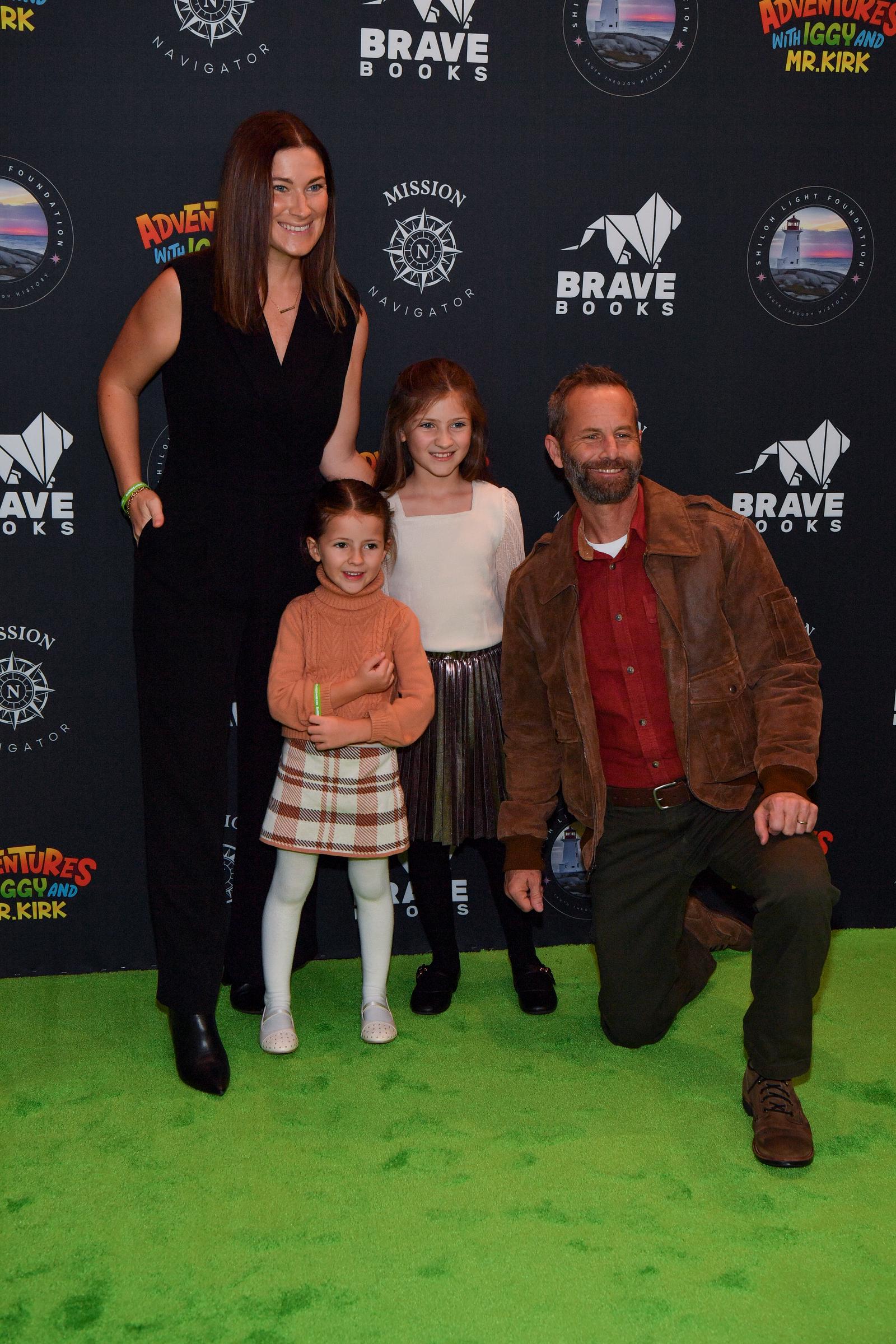 Christine Yeargin and her children with Kirk Cameron at the "Adventures of Iggy and Mr. Kirk" premiere on November 14, 2024, in Nashville, Tennessee | Source: Getty Images