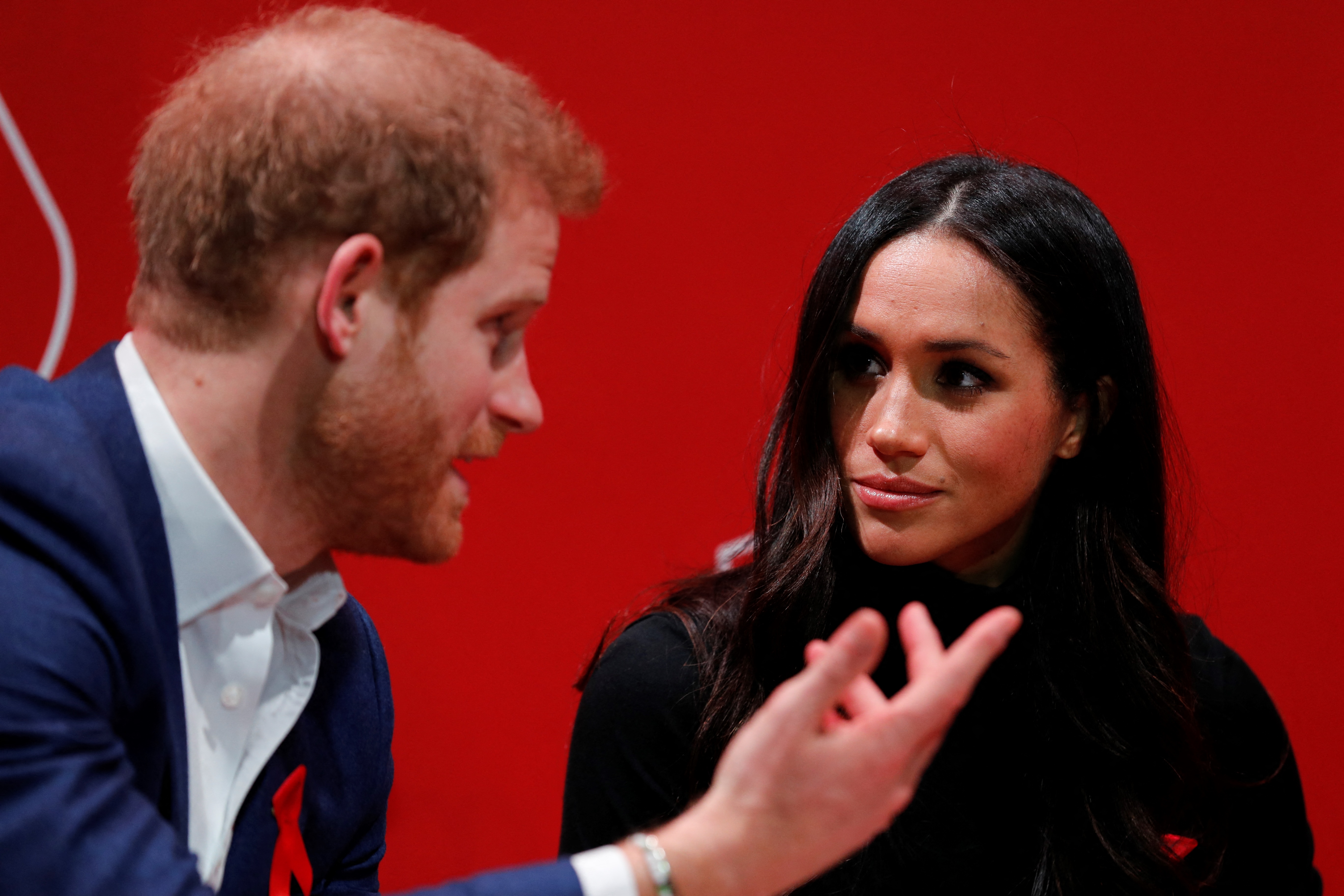 Prince Harry and Meghan Markle during their tour at the Terrence Higgins Trust World AIDS Day charity fair on December 1, 2017, in Nottingham, England. | Source: Getty Images