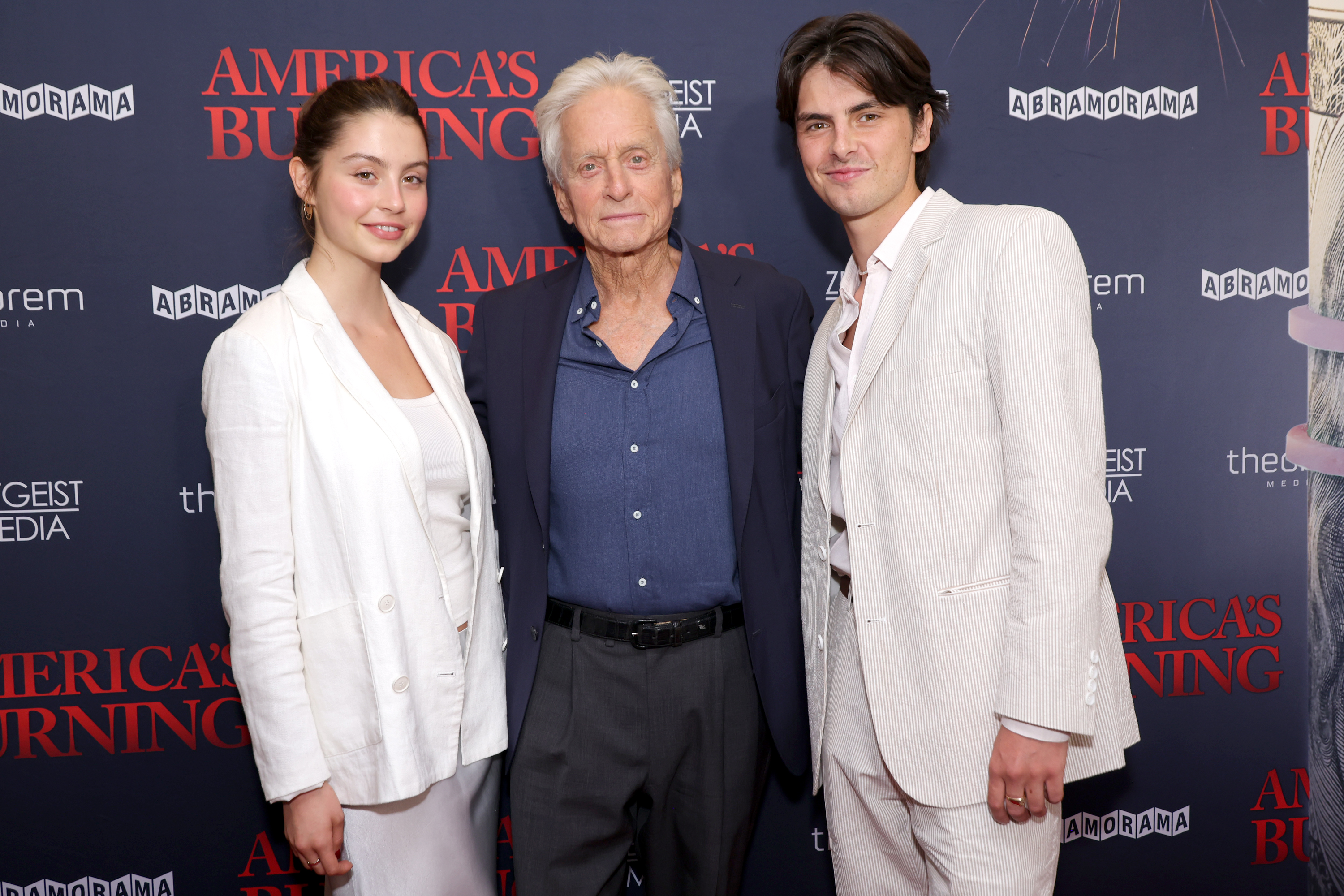 Michael Douglas and his children, Carys and Dylan Douglas, attend the "America's Burning" New York screening at DGA Theater on July 10, 2024. | Source: Getty Images