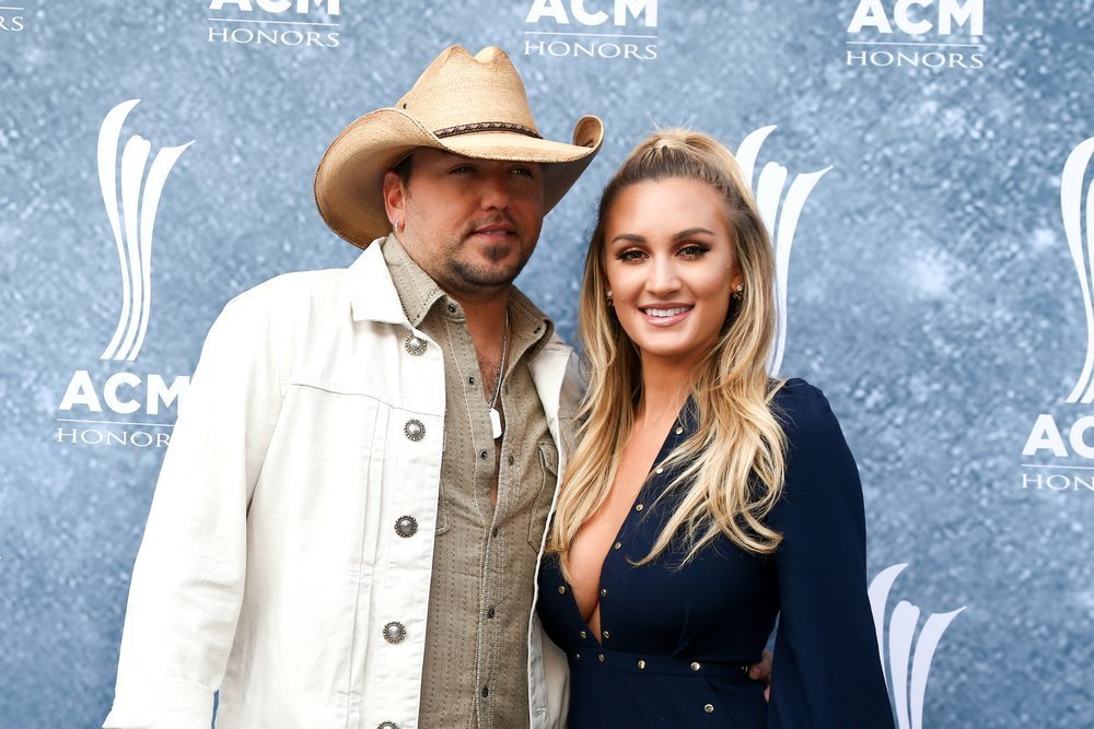 Jason Aldean (L) and wife Brittany Kerr attend the 9th Annual ACM Honors at the Ryman Auditorium on September 1, 2015 in Nashville, Tennessee |Shutterstock