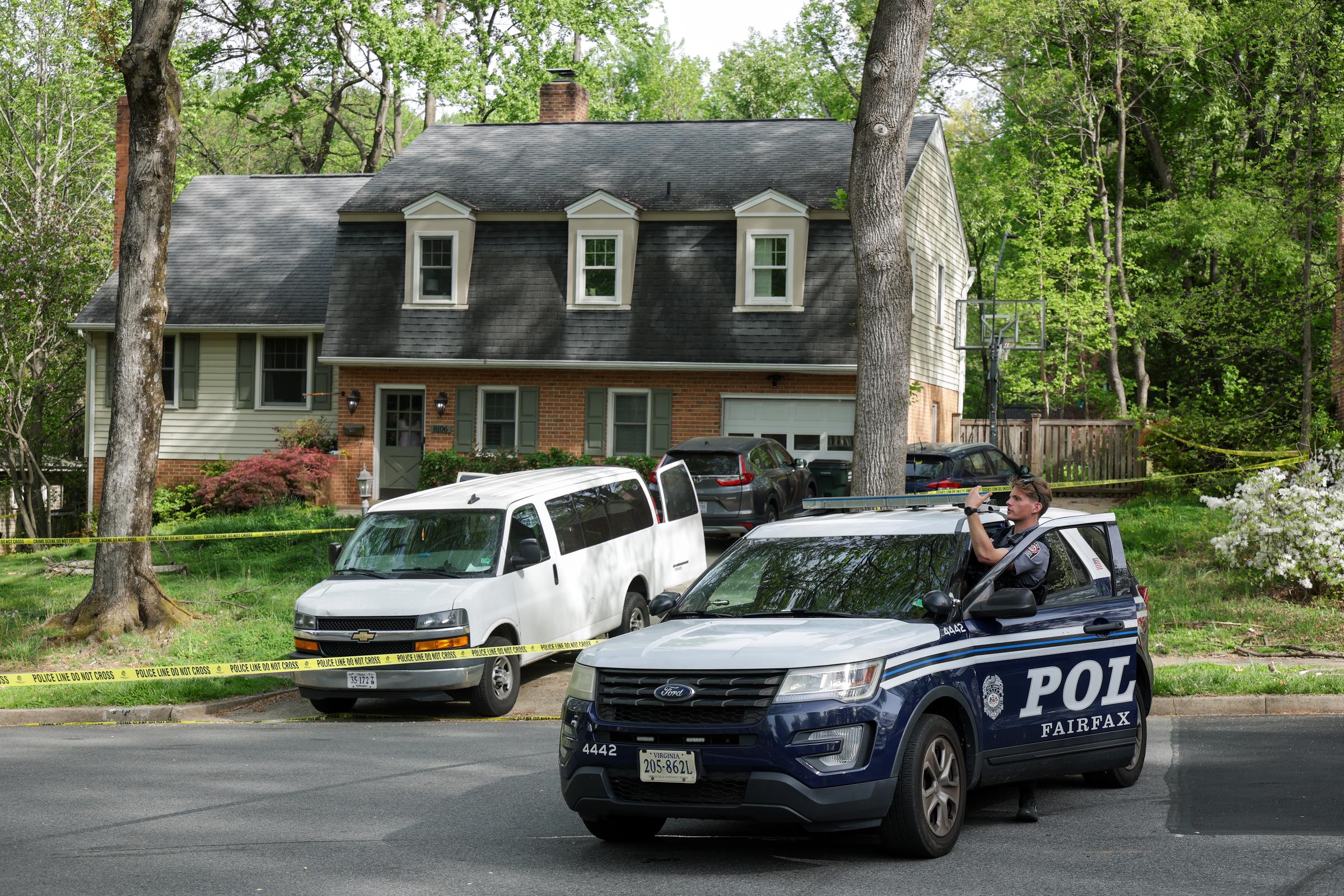 A police vehicle is parked outside the Fairfax residence as officers monitor the secured area in Annandale, Virginia on April 16, 2026 | Source: Getty Images