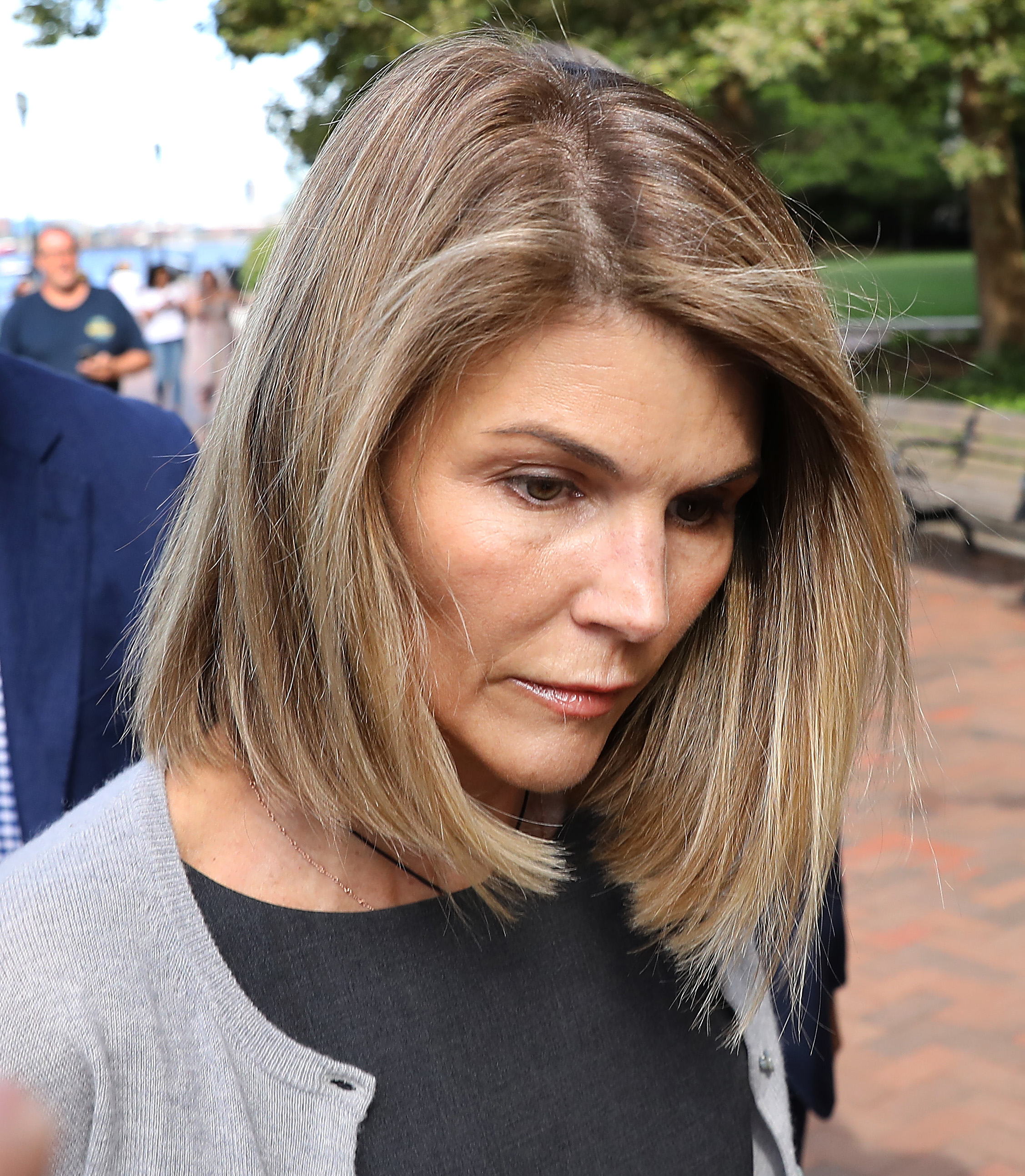 Lori Loughlin leaves the Moakley U.S. Courthouse in Boston on August 27, 2019, during proceedings in the college admissions case | Source: Getty Images