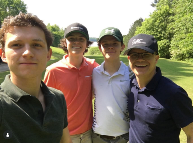 He took inspiration from his father on how to handle criticism gracefully as his career progressed. In this photo, he and his brothers posed at a golf course on May 5, 2024. | Source: Instagram/dommoholland