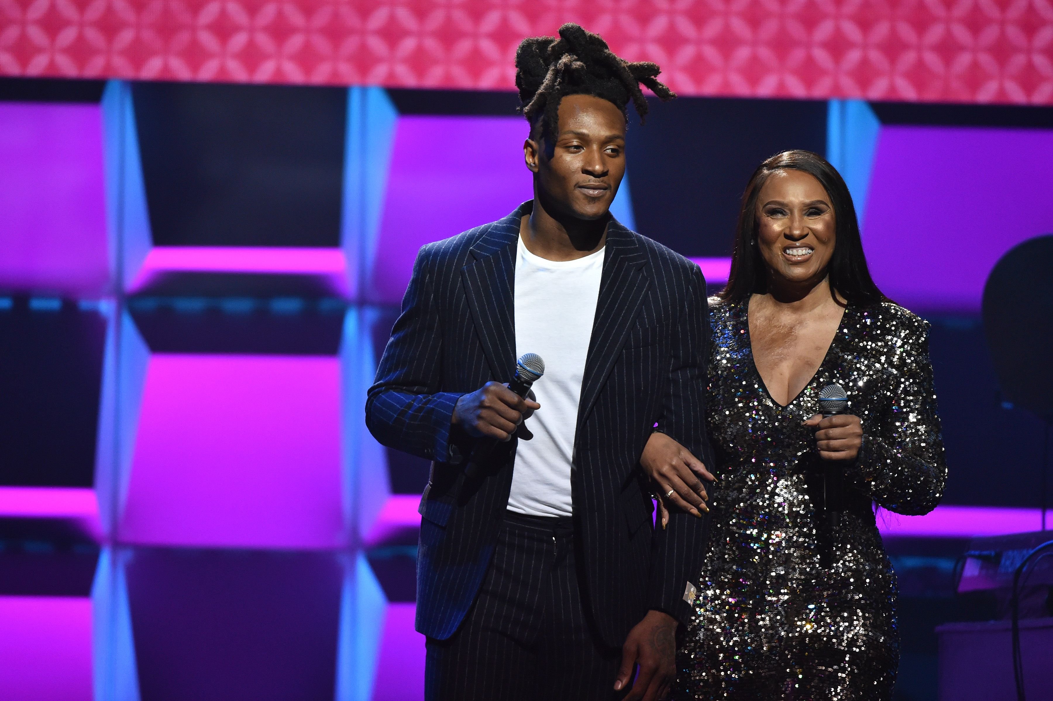 DeAndre Hopkins and Sabrina Greenlee onstage during the BET Super Bowl Gospel Celebration in January 2020 in Miami, Florida | Source: Getty Images