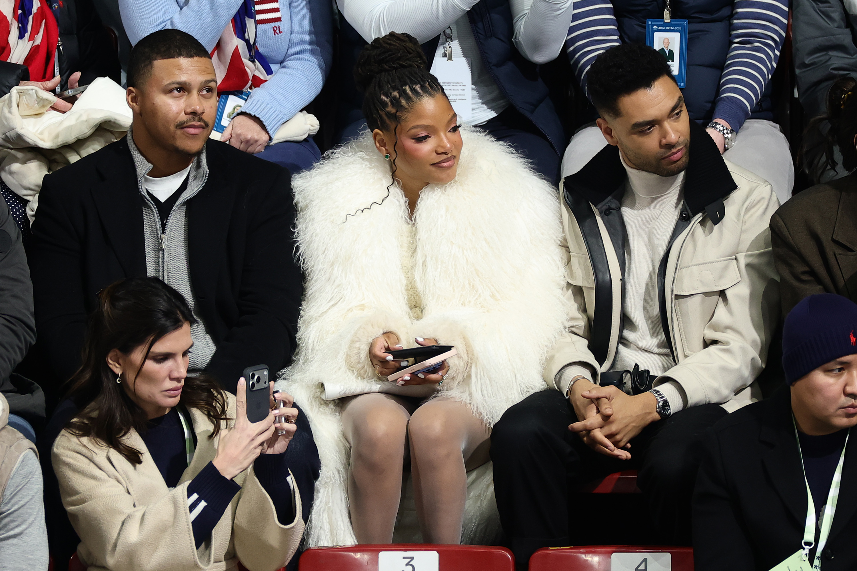 Halle Bailey and Regé-Jean Page attend the Women's Single Skating - Short Program on day 11 of the Milano Cortina Winter Olympic games at Milano Ice Skating Arena on February 17, 2026, in Milan, Italy | Source: Getty Images