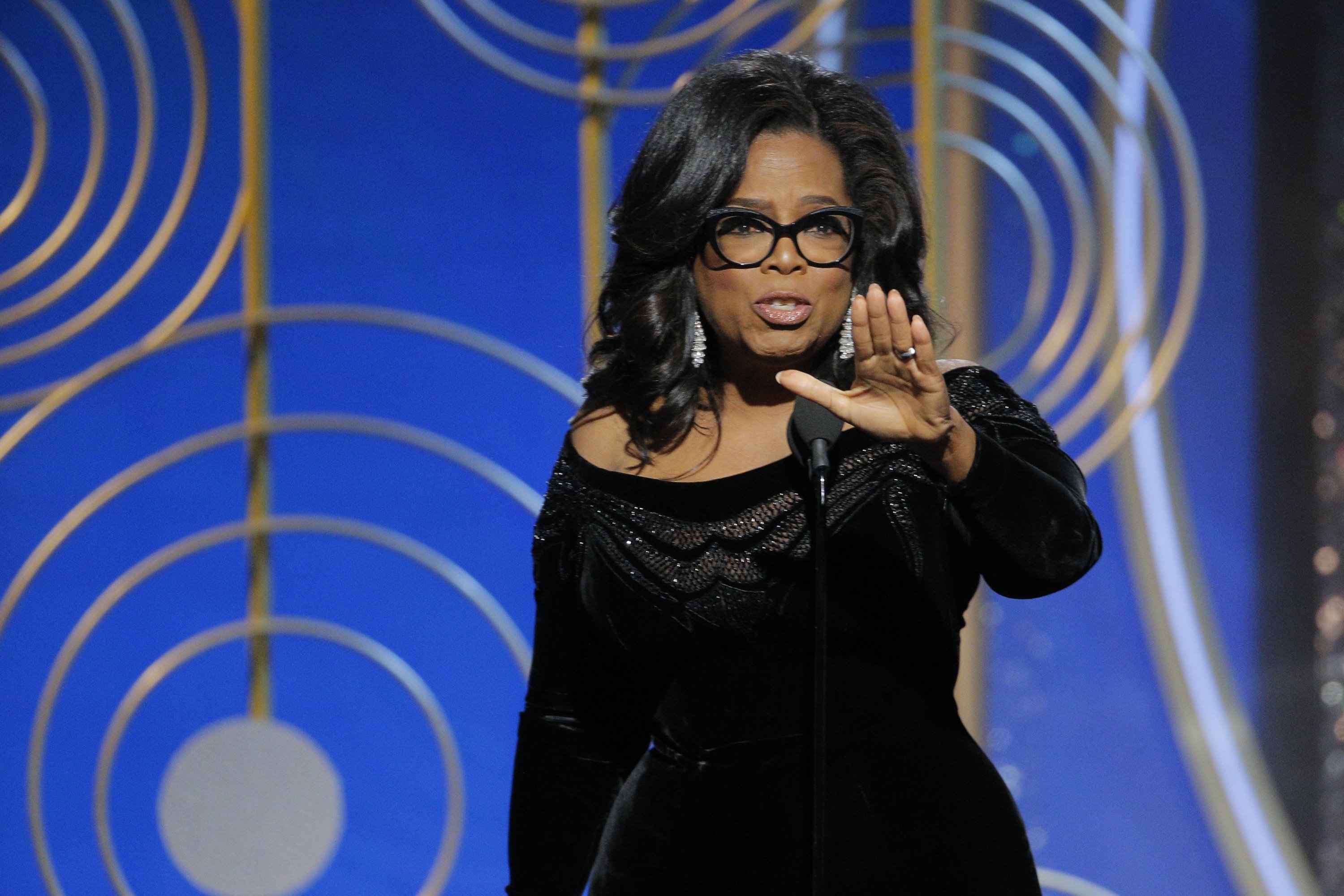 Oprah Winfrey accepting her 2018 Cecil B. DeMille Award during the 75th Golden Globe Awards. | Photo: Getty Images