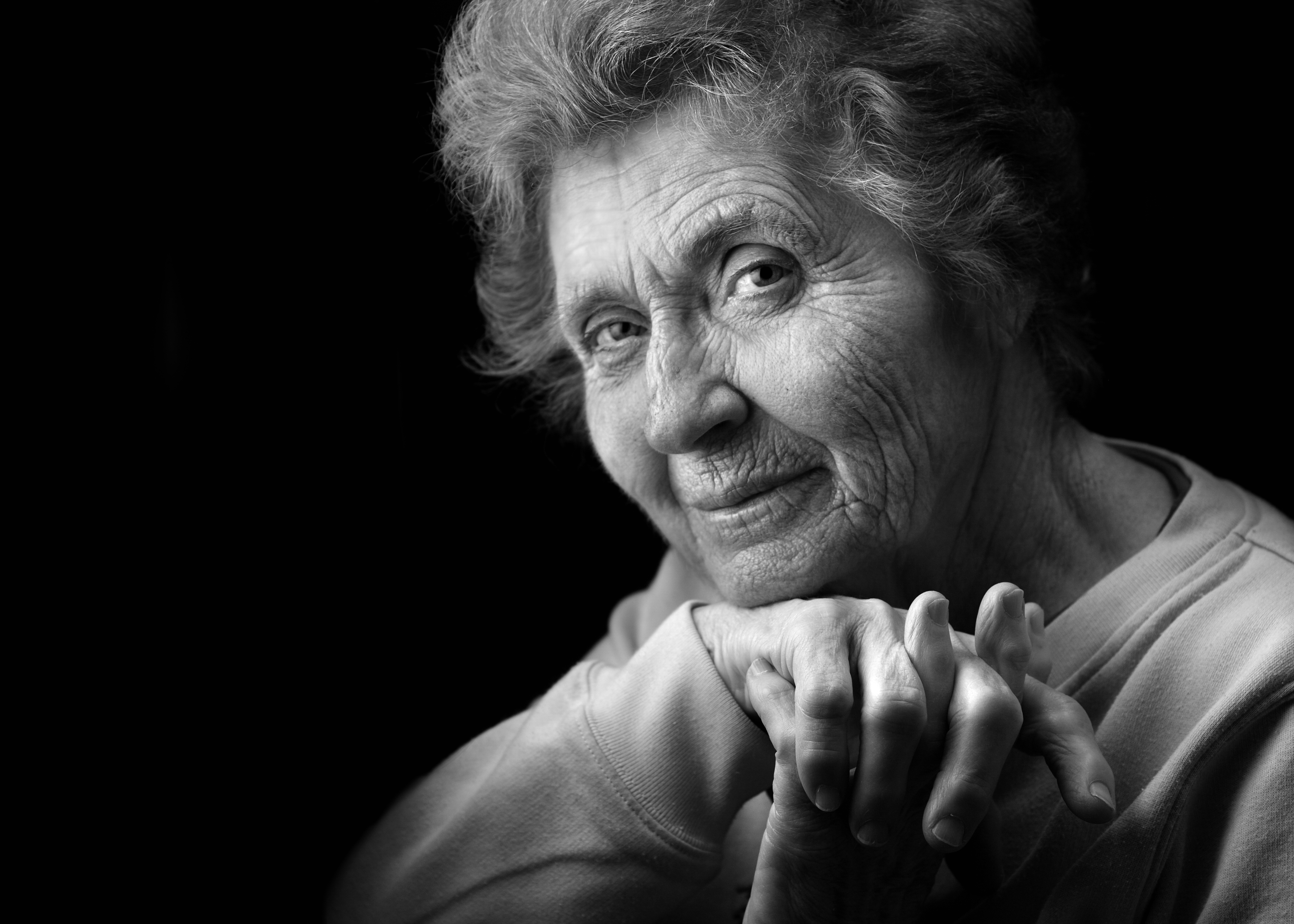 An elderly woman posing for the camera | Source: Shutterstock