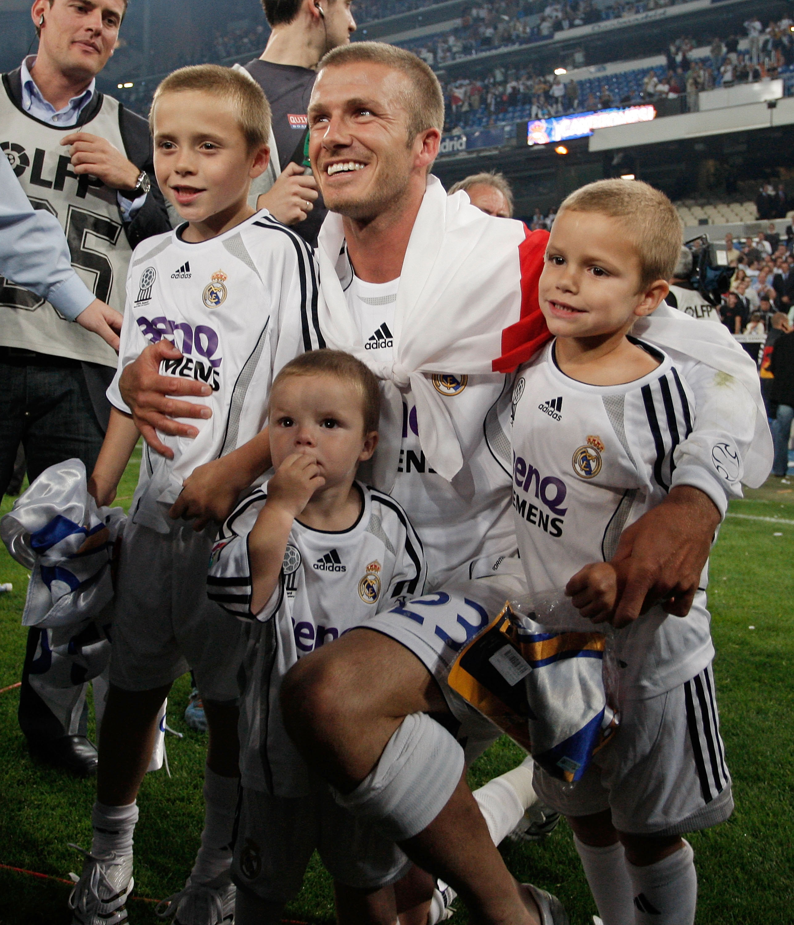 David Beckham with his sons after the soccer match between Real Madrid and Mallorca at the Santiago Bernabéu stadium on June 17, 2007, in Spain. | Source: Getty Images