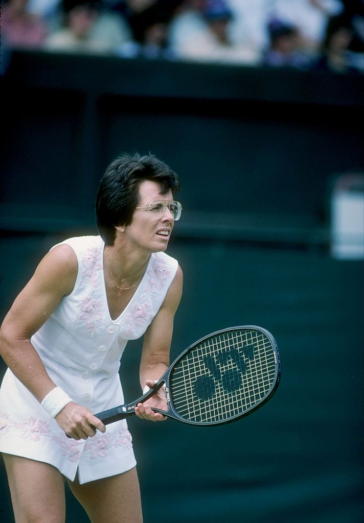 An undated image of Billie Jean King standing on the court during a match at Wimbledon in England | Photo: Getty Images