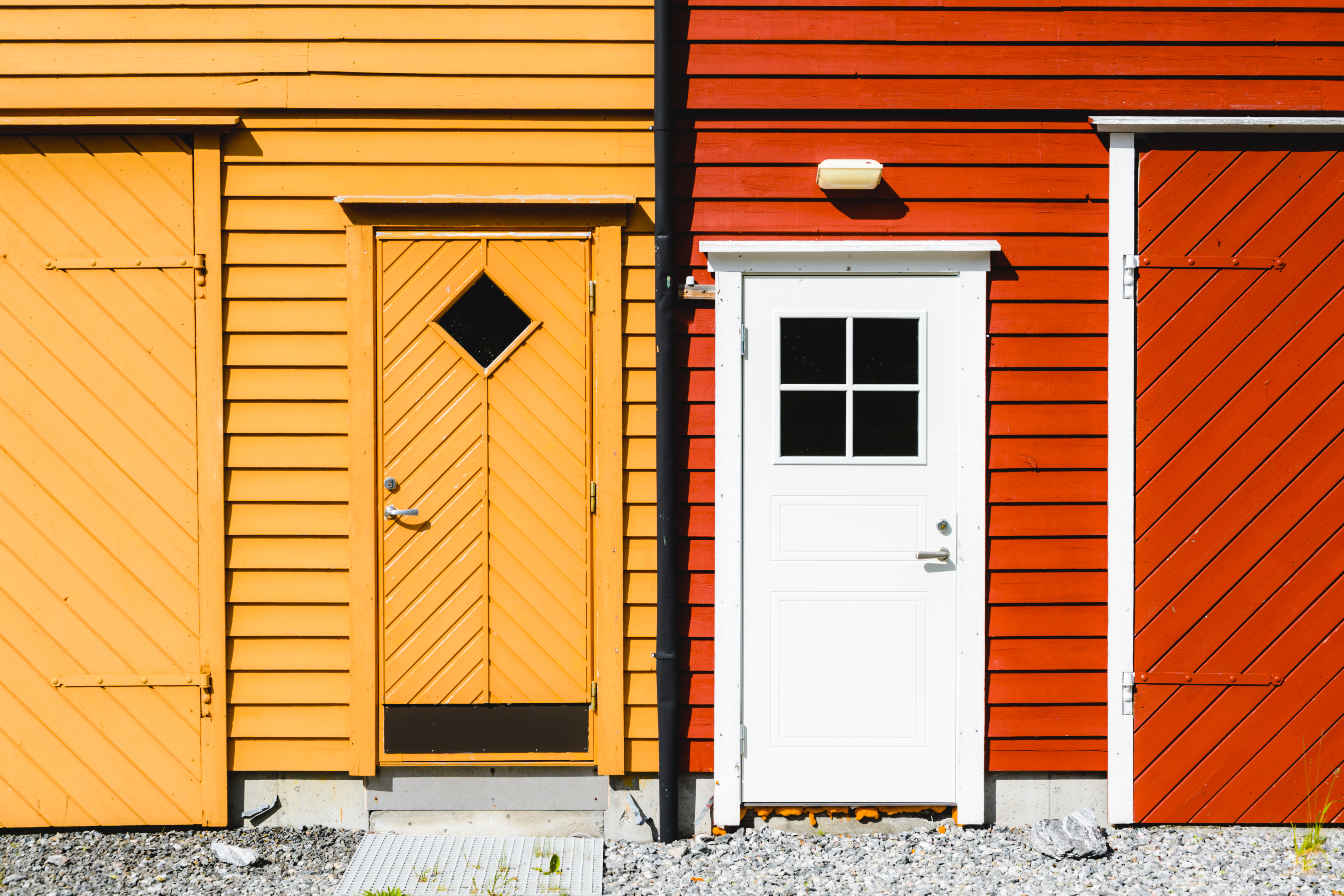 Doors of two neighboring houses | Source: Getty Images
