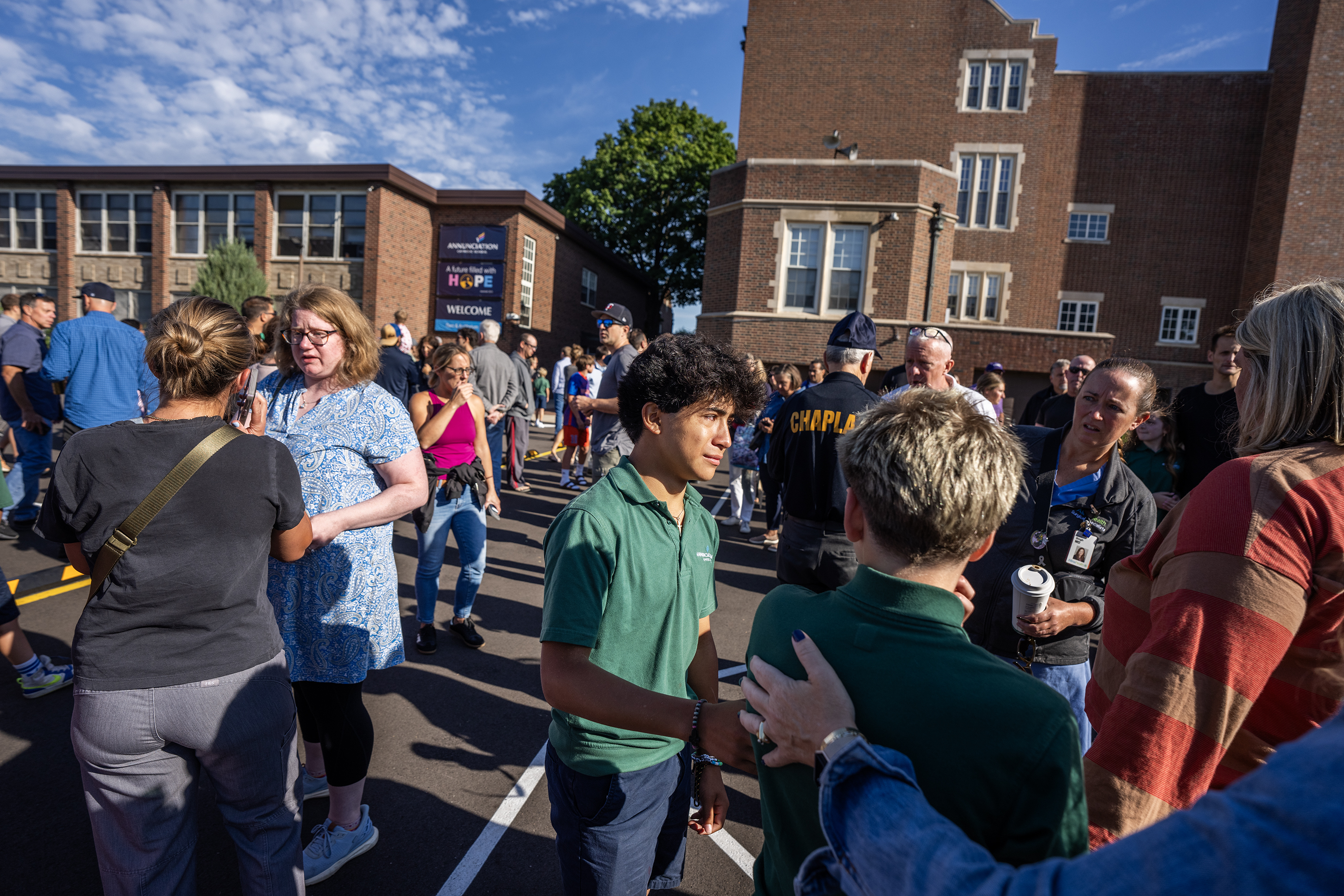 Parents and students gather outside Annunciation Church in Minneapolis after the shooting on August 27, 2025 | Source: Getty Images