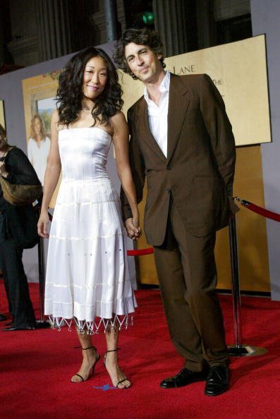 Sandra Oh and Alexander Payne attend the film premiere of "Under The Tuscan Sun" at the El Capitan Theatre on September 20, 2003, in Hollywood, California. | Source: Getty Images.