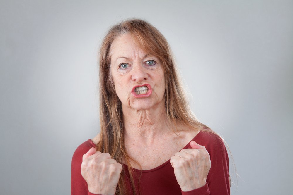 A portrait of a senior woman looking angry. | Photo: Shutterstock
