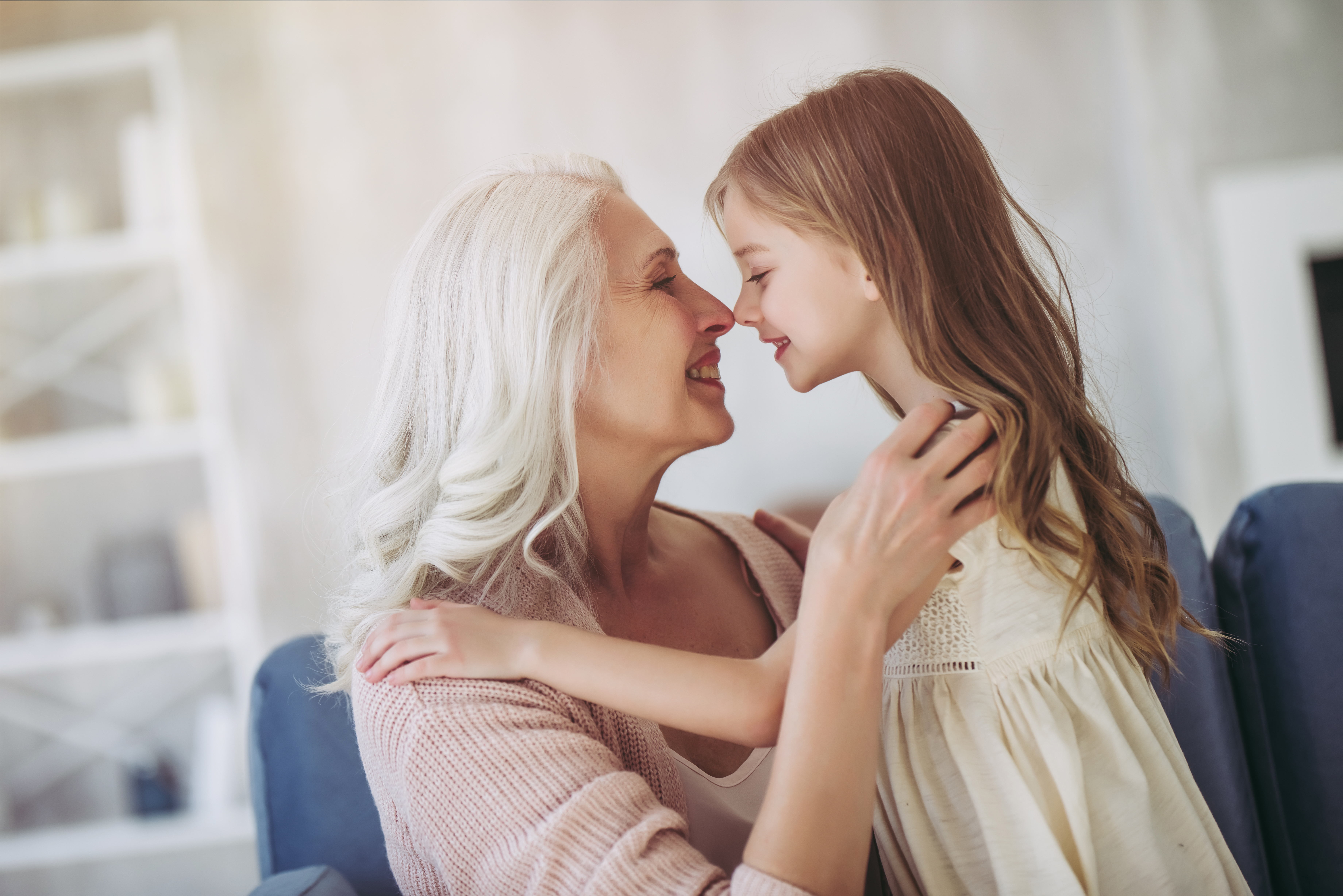 A grandmother spending time with her little granddaughter | Source: Shutterstock