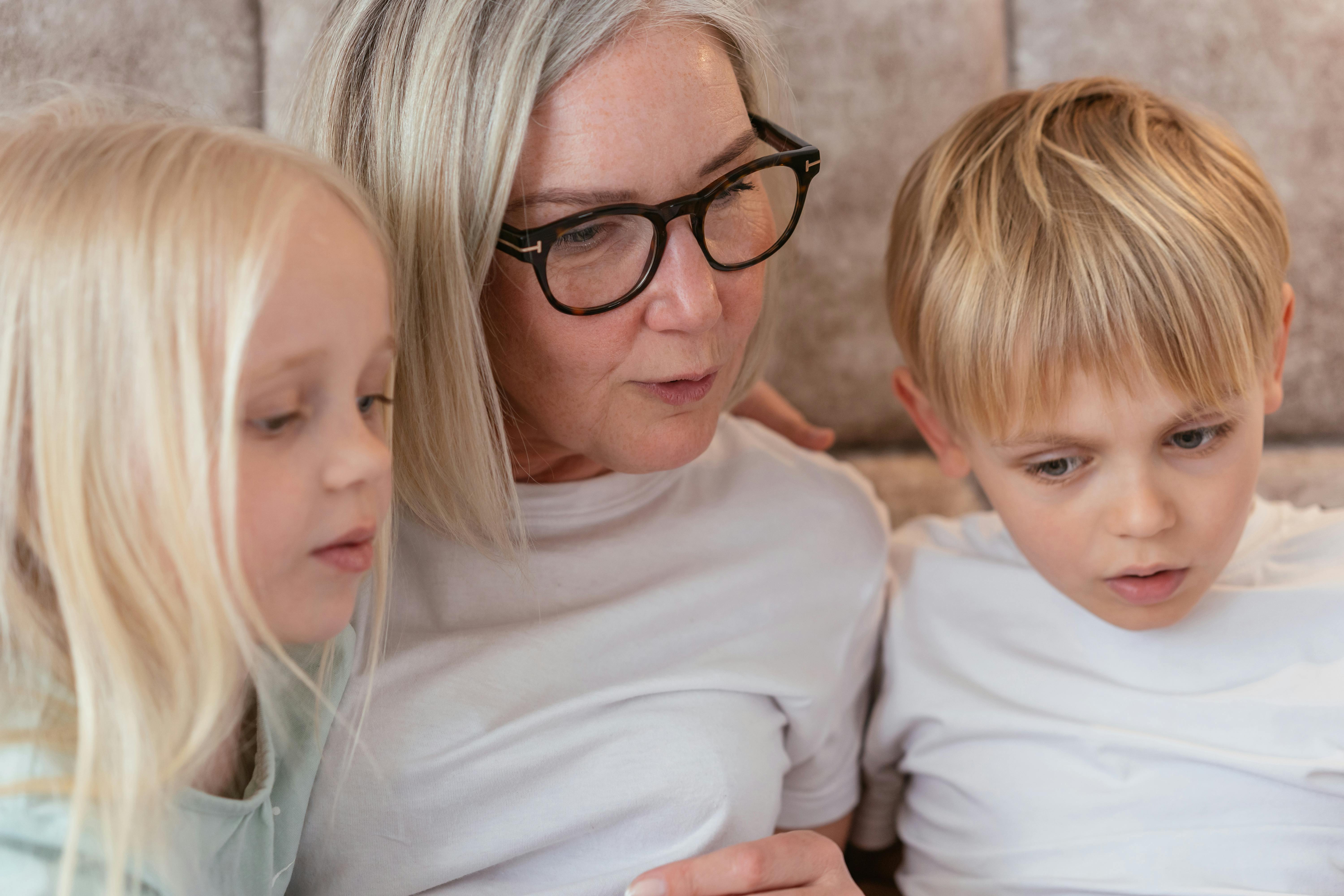 A woman bonding with her grandchildren | Source: Pexels