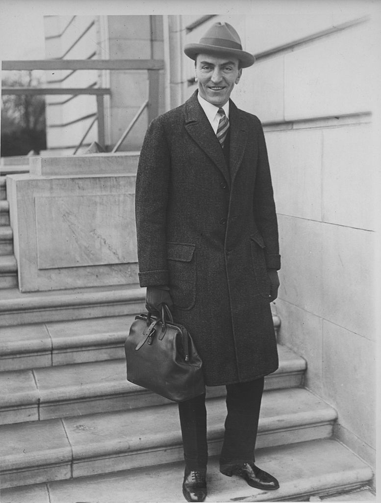 Captain Edward Vernon Rickenbacker leaves the offices of the House Aircraft Inquiry Committee, 1925 | Source: Getty Images