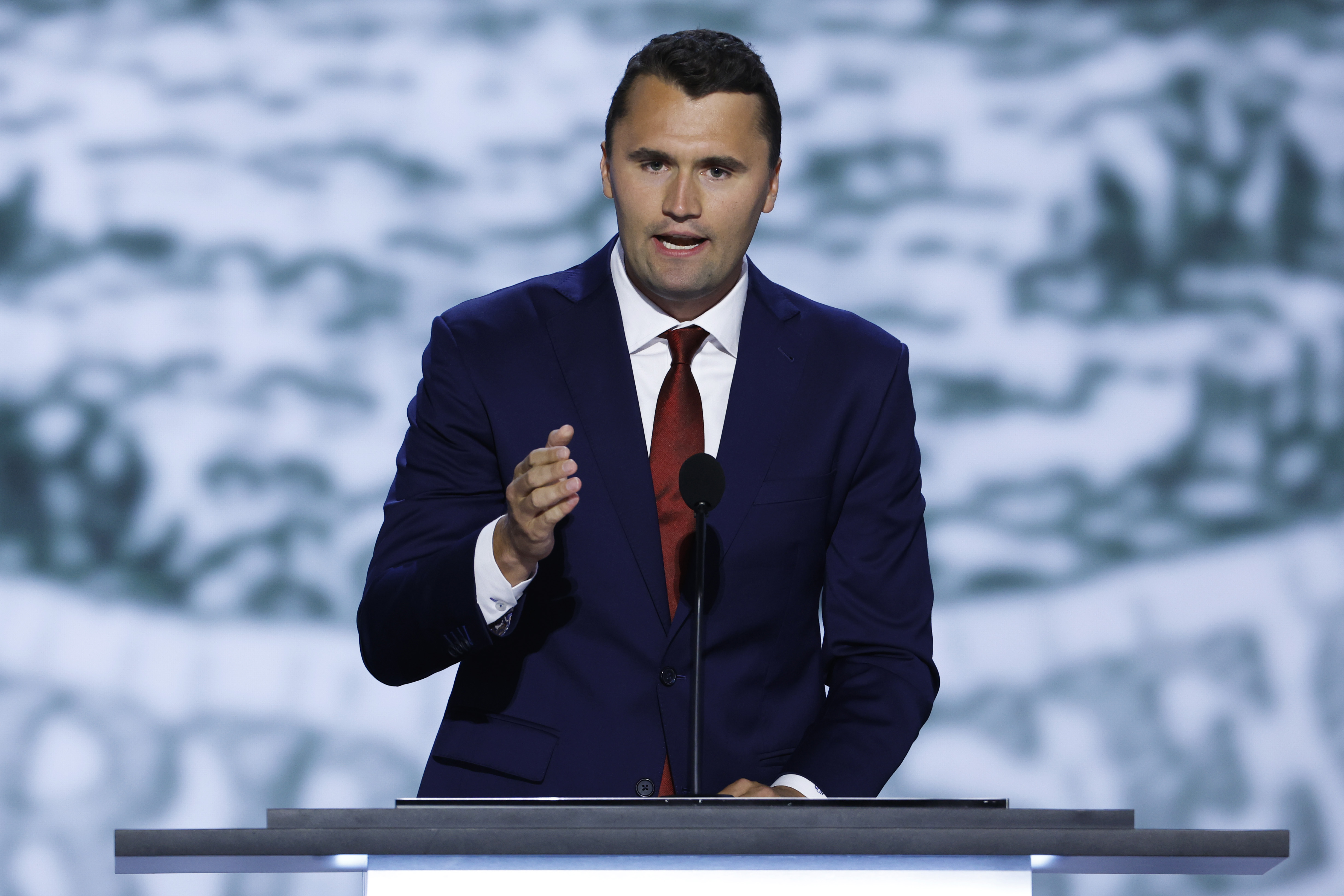 Charlie Kirk speaks on stage on the first day of the Republican National Convention at the Fiserv Forum on July 15, 2024 in Milwaukee, Wisconsin | Source: Getty Images