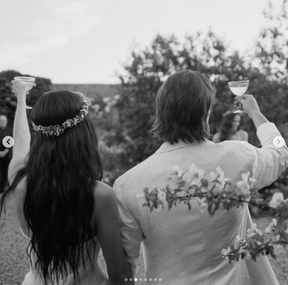 Jesse Light and Jesse Bongiovi toasting during their five-day wedding celebration, posted on July 14, 2024 | Source: Instagram/alison_events