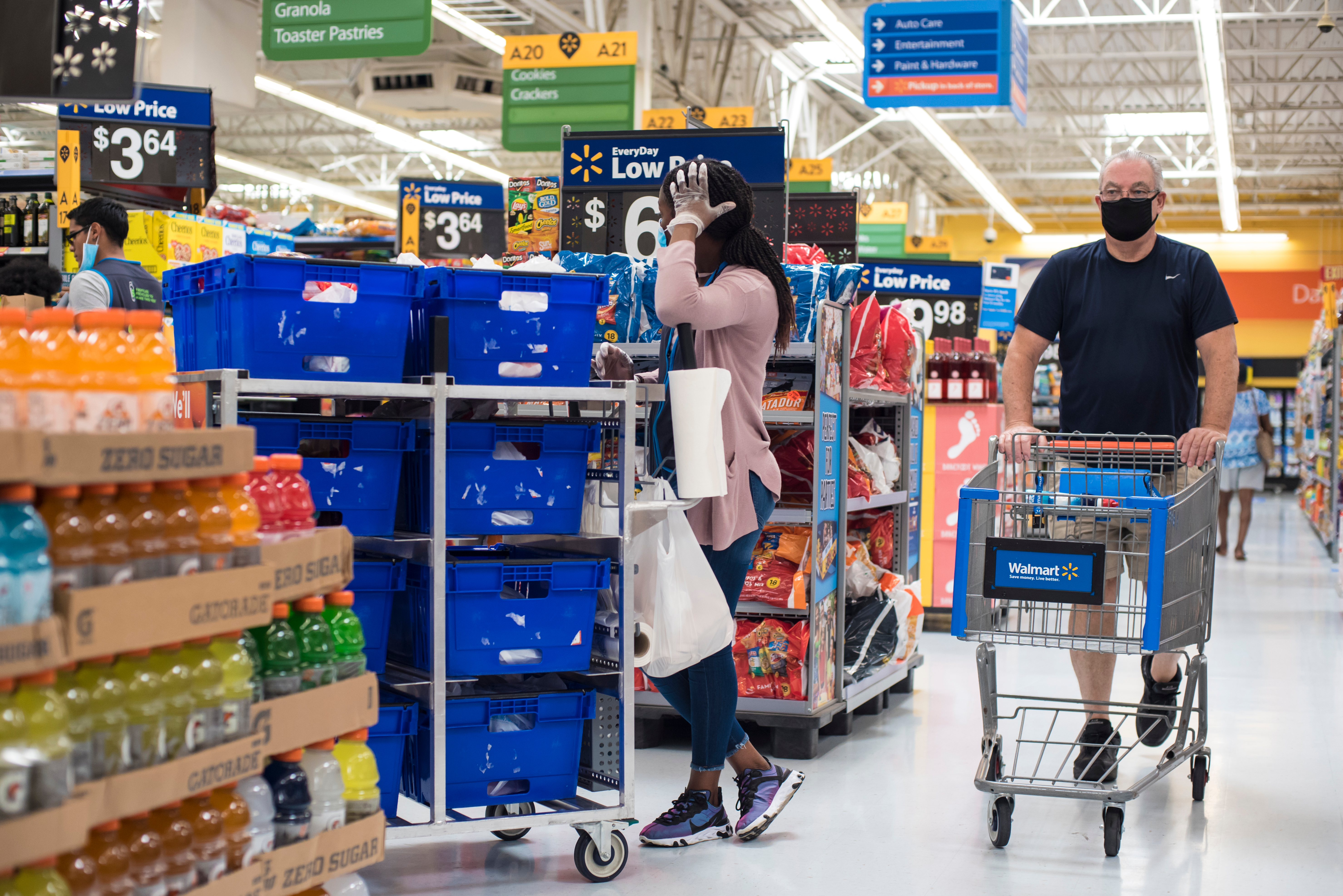 People shopping in Walmart | Source: Shutterstock