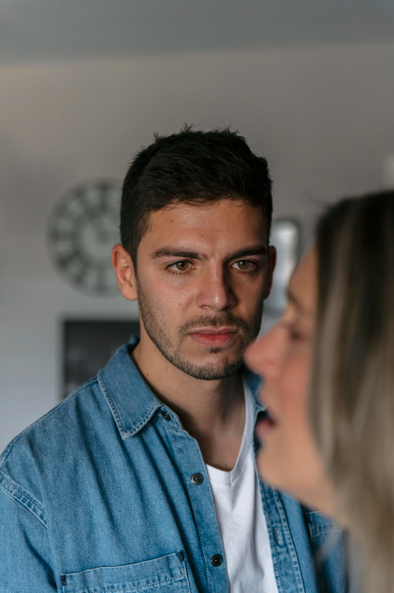 A man looks at his crying wife during an argument | Source: Freepik