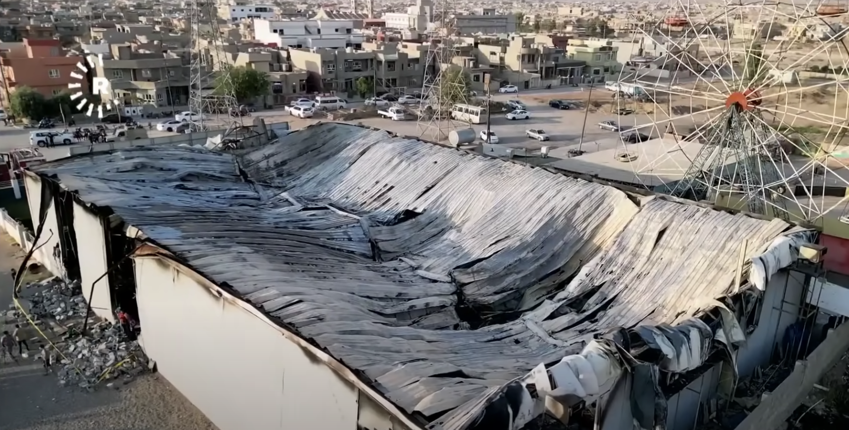 The caved-in roof of Haneen and Revan Isho's wedding venue | Source: youtube.com/@SkyNews