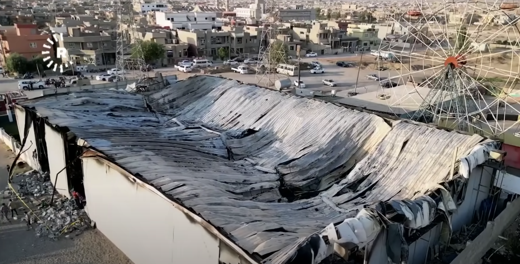 The caved-in roof of Haneen and Revan Isho's wedding venue | Source: YouTube.com/@SkyNews