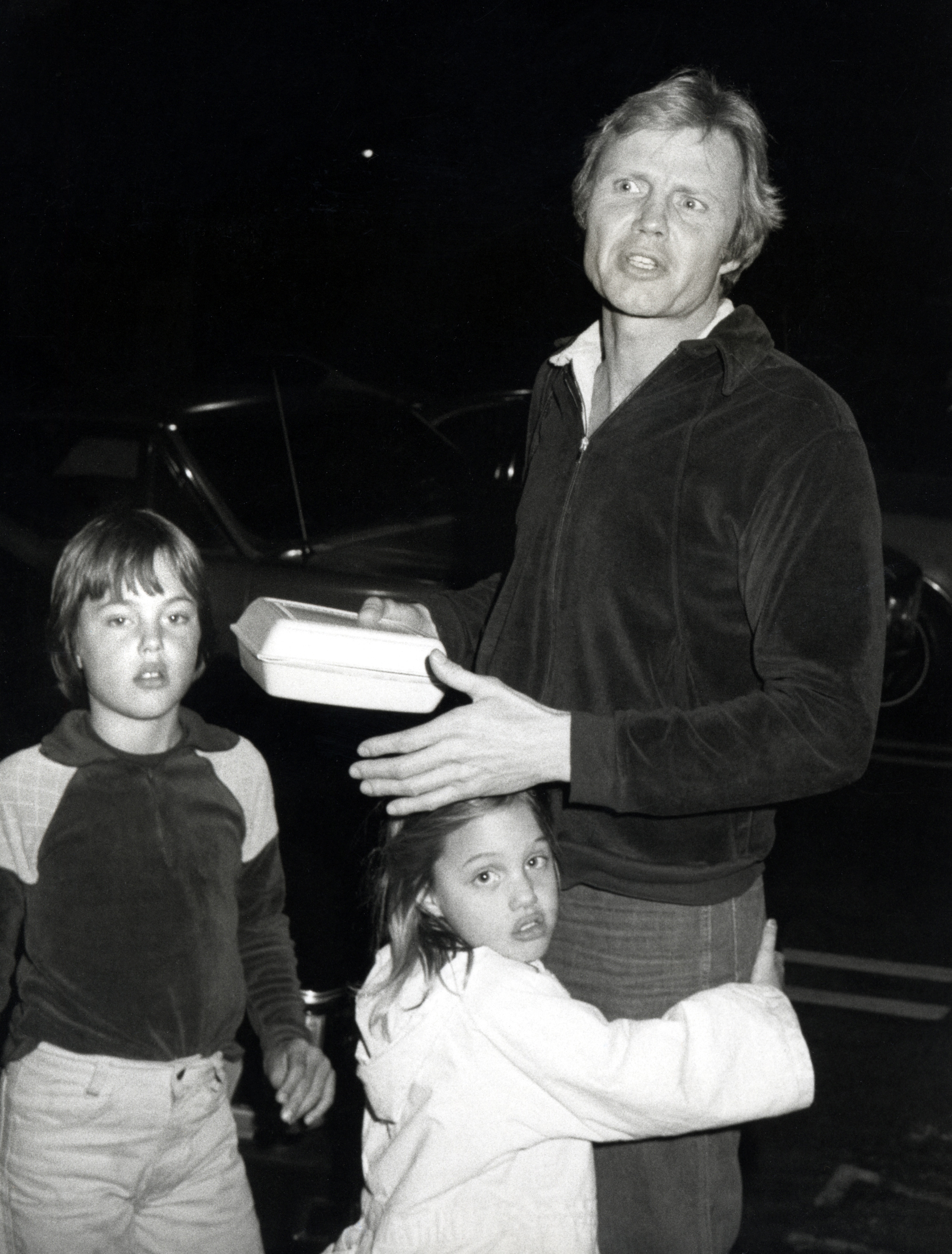 A throwback photo of Jaime Haven Voight, Angelina Jolie, and Jon Voight. | Source: Getty Images