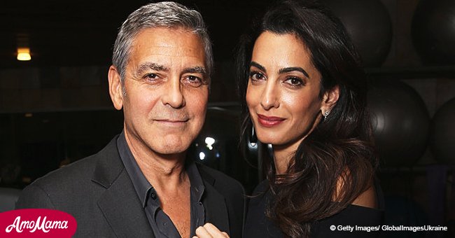 George and Amal Clooney look besotted at a red carpet event one year after welcoming twins