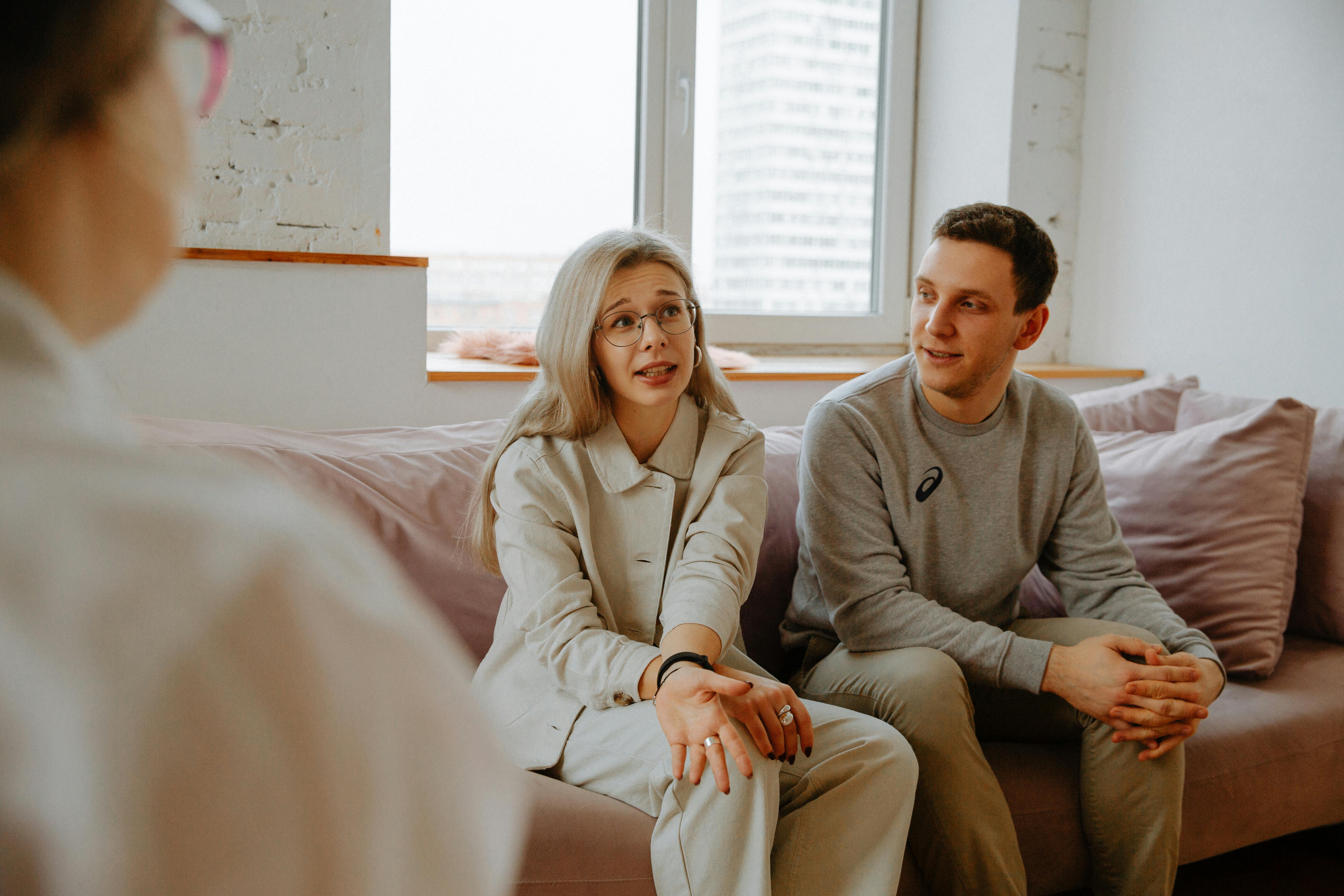 A couple talking with a therapist | Source: Pexels