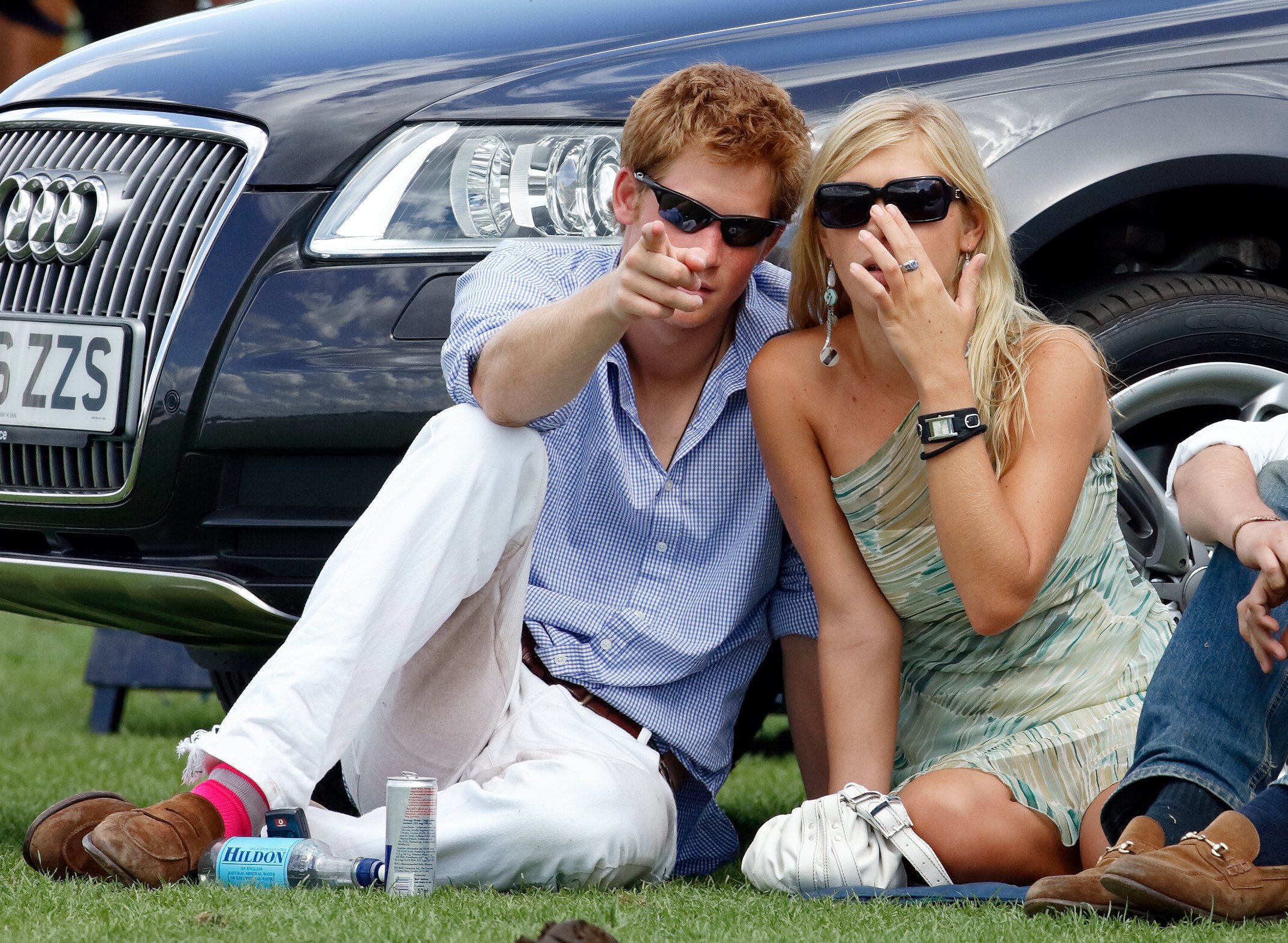 Prince Harry and Chelsy Davy attend the Cartier International Polo Match at Guards Polo Club, Smith's Lawn on July 30, 2006 in Egham, England.