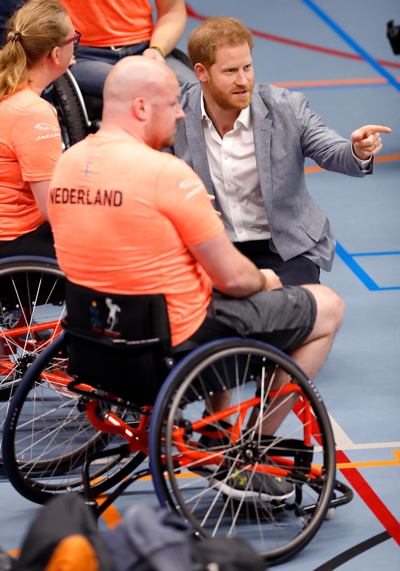 Prince Harry, Duke of Sussex meets Dutch competitors as he visits Sportcampus Zuiderpark to mark the official launch of the Invictus Games The Hague 2020 in The Hague, Netherlands, on May 9, 2019 | Source: Getty Images