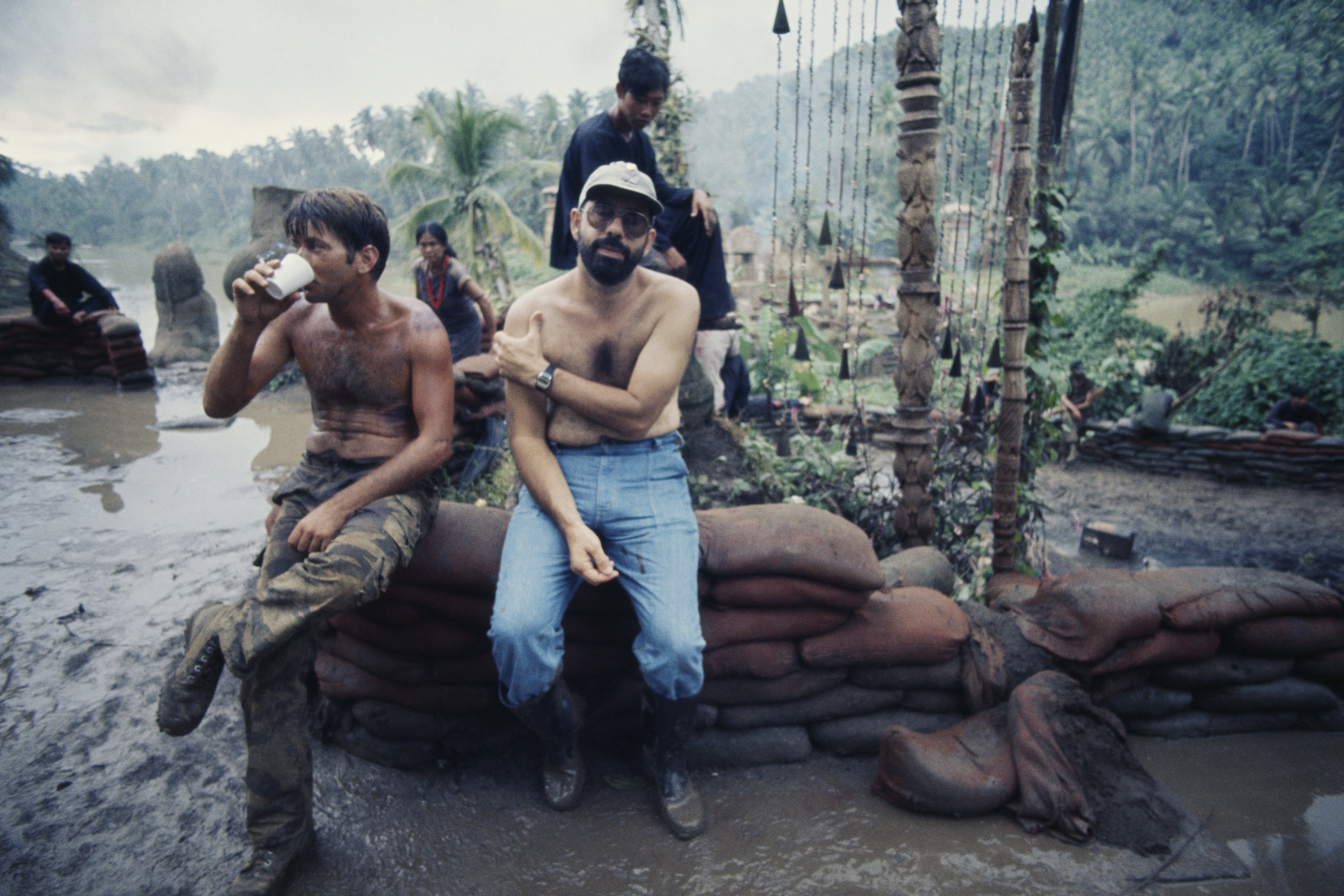 Martin Sheen and director Francis Ford Coppola on the set of "Apocalypse Now" on January 1, 1976.┃Source: Getty Images